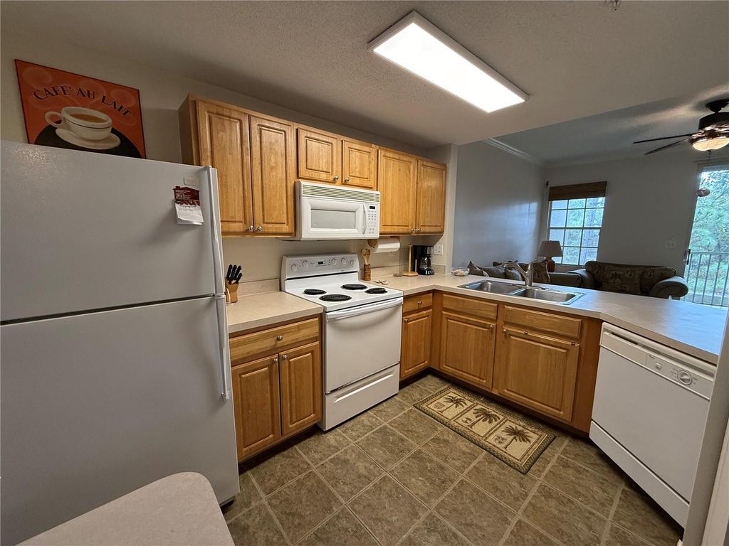 Photo of 4751 Travini Circle #4-115, Sarasota, FL 34235 (MLS # A4675843)