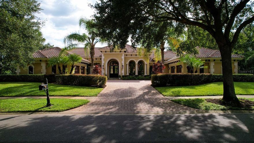 Prepare to be impressed with this expansive 6,176 sq ft of living space all on one level! The Allesandro model was built by custom builder Dave Konkel and it was a finalist for the distinguished Aurora Award. This estate home features old world styling with elegance, featuring  hand painted beams and ceilings, stone floors, freshly painted walls and Ventian plaster accents. The kitchen is spacious and features Busby cabinetry, Sub-Zero and Wolf appliances and much more.
The owner's suite is the ultimate space that includes a grand bedroom exercise room or baby nursery and a private courtyard off the elegant owner's bath. Outside of the primary owner's suite is a grand and formal office with a two-sided fireplace over looking the pool and spa.
If you enjoy outdoor entertaining look no further, as this home has a beautiful summer kitchen, a massive covered lanai and a huge pool deck. It also has a large fenced lawn for family and pets to play. Additionally, this grand home has a large game room or theater that overlooks the pool and summer kitchen.
Featuring 5 bedrooms, 4 1/2 baths and a 4 car garage. Plus a large laundry room with a sink and built-ins. This special home won't last long. Call for your showing and private tour in this exclusive 24 hour guard gated community!
