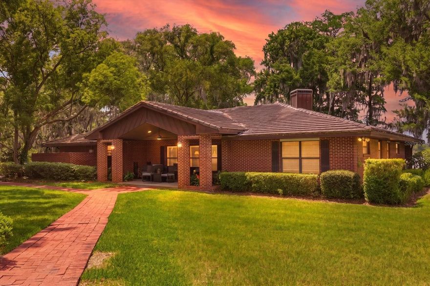 A truly rare find in Winter Springs. This equestrian-friendly, lakefront estate is complete with its own private tennis court, a solid block-constructed horse barn, and room to enjoy every part of the lifestyle. All of this, tucked in a quiet setting that keeps you close to the heart of Orlando, with the added benefit of being just 2 miles from The Geneva School, one of the area’s premier private education options.

Originally built in 1964, the home was thoughtfully expanded in 1994, creating a larger, more functional layout while preserving its character. Today it offers over 3,000 SF overlooking the shimmering waters of Little Lake Howell. Enjoy west-facing sunset views framed by mature cypress trees. Host friends for tennis or pickleball right in your backyard.

The sizeable horse barn was engineered for exceptional durability, built with block construction and poured concrete for maximum strength. The main home includes a 3-car garage, and the barn adds an oversized carport that can easily double as covered boat storage.