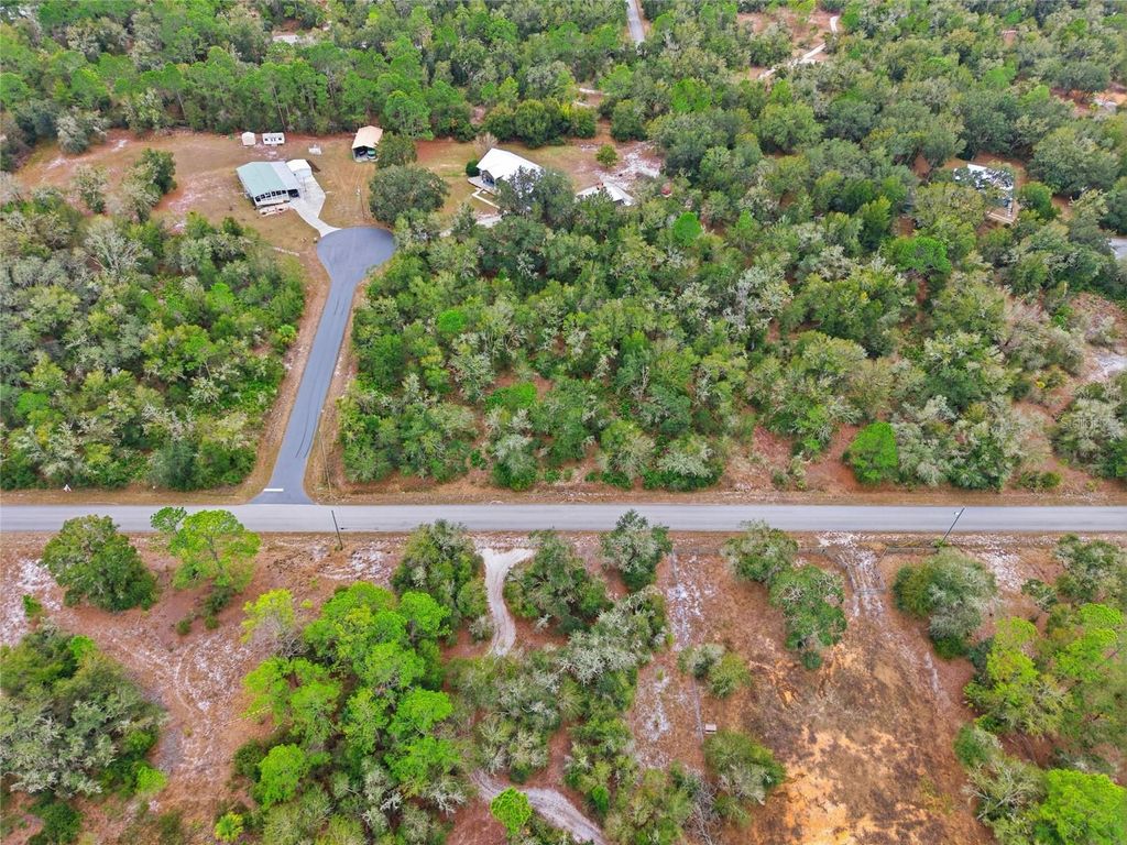 Photo of 9920 N Pink Moss Point, Crystal River, FL 34428 (MLS # OM715318)