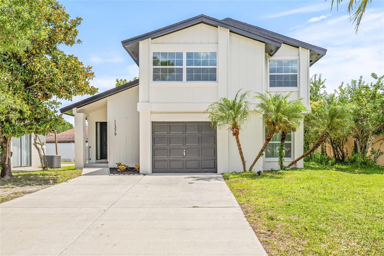 Welcome to this beautifully renovated 3-bedroom, 2.5-bathroom two-story home with a 1-car garage, offering charm, style, and functionality in one perfect package. From the moment you arrive, you’ll fall in love with the adorable curb appeal and inviting exterior that sets the tone for what’s inside. Step through the front door and into a bright, open floor plan filled with natural light and new flooring throughout. The spacious living room flows seamlessly into the dining area and updated kitchen, creating a perfect layout for both everyday living and entertaining. The kitchen features brand-new appliances, ample counter space, and generous cabinetry, making it as practical as it is stylish. Just off the kitchen, you’ll find a cozy family room and a convenient half bathroom near the front entry. Upstairs, discover three well-appointed bedrooms, including a spacious primary suite with a large walk-in closet and a beautifully renovated ensuite bathroom that you will fall in love with. The two additional bedrooms are light, airy, and versatile—perfect for guests, family, or a home office. The 1-car garage includes washer and dryer hookups for added convenience. Step out back to enjoy a private patio and large backyard, ideal for outdoor dining, gardening, or simply enjoying Florida’s sunshine. This home offers peace of mind with major system updates, including a 2-year-old roof, a 2022 HVAC system, and a brand-new water heater. Best of all, the home is not located in a flood zone. As a resident, you'll enjoy access to a wide range of exceptional community amenities, including a clubhouse, parks, walking trails, playgrounds, and two swimming pools. Sports enthusiasts will love the baseball field and basketball, tennis, racquetball, handball, and volleyball courts, as well as a full soccer field—perfect for staying active and enjoying the outdoors year-round. Located near some of Tampa’s top attractions, you're just minutes from Busch Gardens, the Tampa Riverwalk, the Florida Aquarium, and a variety of great restaurants and shopping destinations. Don’t miss your chance to own this turnkey home in a vibrant and convenient location. Schedule your showing today!