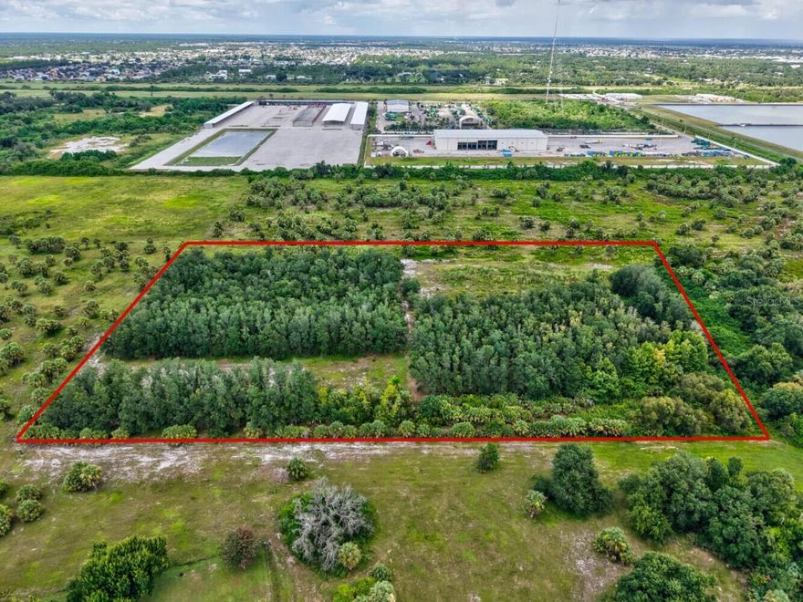Currently zoned RE-1 but retaining its original grandfathered AE zoning, this property offers rare flexibility for agricultural, equestrian, livestock, and commercial agricultural ventures in Southwest Florida. Located just minutes from Port Charlotte, I-75, and US-41, it provides both the privacy of country living and the convenience of quick access to major routes, shopping, dining, and Gulf Coast beaches. This tract includes approximately 6.25 acres (376.5 x 660) with owner financing available and is one of seven parcels offered—totaling up to 45 acres if purchased together. Formerly a thriving tree farm, the land is ideal for crops, pasture, horses, or cattle, with sandy-loam soil, irrigation that provide abundant water for hay, fodder, and specialty crops. The property’s location and infrastructure also make it perfect for a Florida nursery property, landscaping business, or small farm operation, and it would make an outstanding private home site for those looking to move to Southwest Florida. With no wetlands or stormwater set-asides, every acre is usable. A nearby vacant lot on Harborview Rd. is also available for signage or an office location. Whether you are searching for Port Charlotte acreage for sale, Florida horse property with wells and irrigation, or the perfect Florida acreage home site with quick access to I-75 and US-41, this unique offering delivers location, infrastructure, and agricultural potential in one of the most desirable areas of the state.