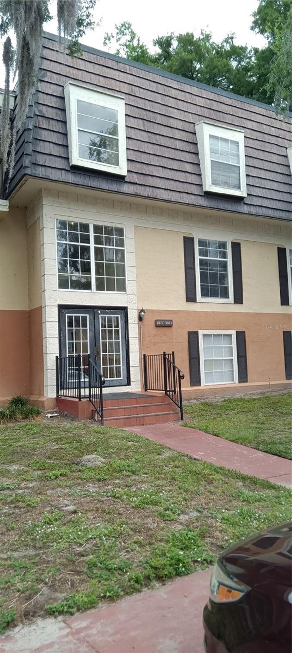 Photo of 3973 Versailles Drive #3973F, Orlando, FL 32808 (MLS # O6411441)