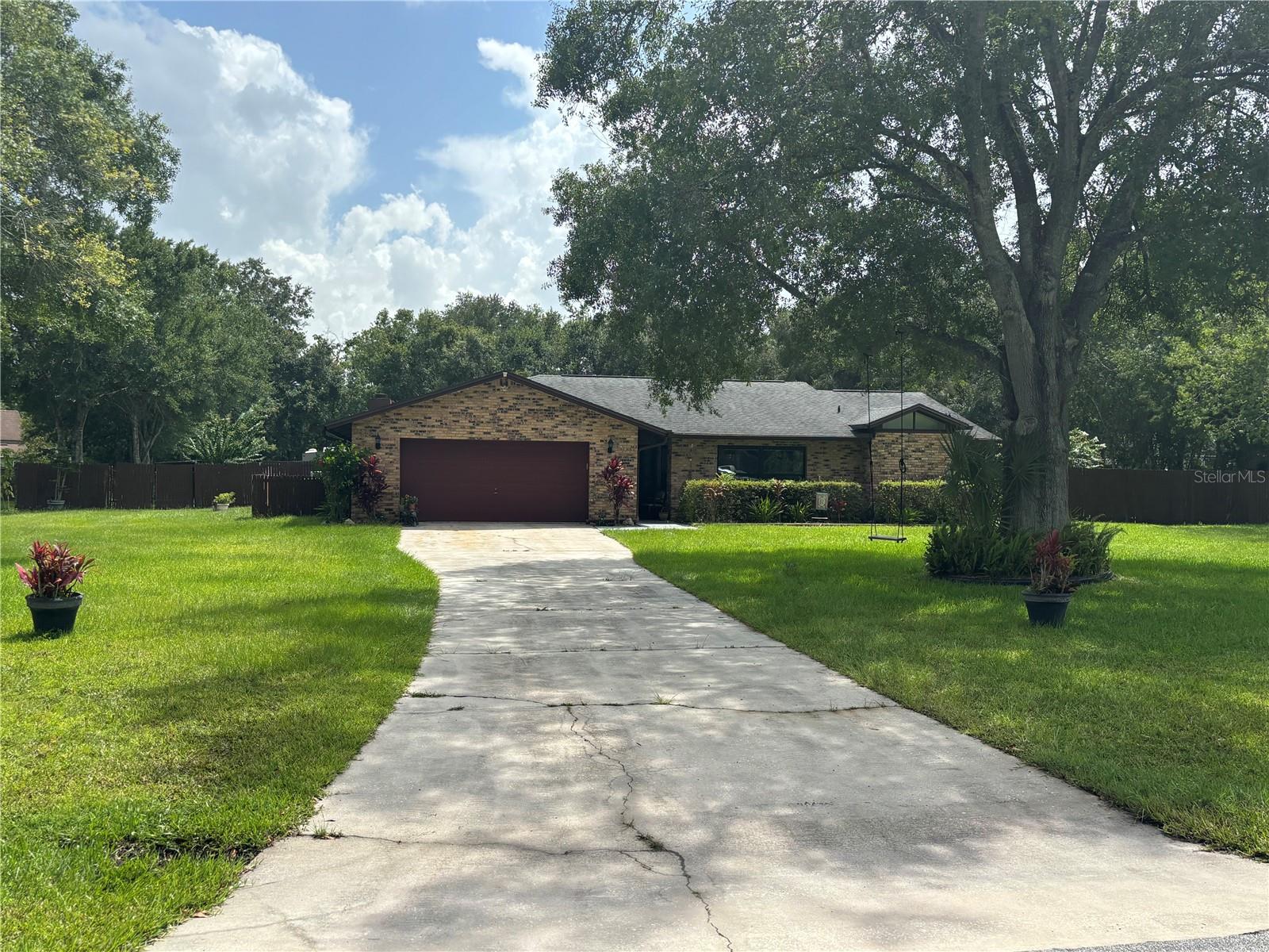 Your Private Florida Oasis Awaits: 1-Acre Pool Home with No HOA! This fantastic 4-bedroom, 2-bathroom Pool home is nestled on a sprawling 1-acre lot with NO HOA, offering you the ultimate freedom and privacy. Dive into summer fun in your very own private pool, perfect for relaxing or entertaining friends and family on those hot Florida days. Inside, you'll love the fresh, modern feel with new windows (2021) letting in tons of natural light. Enjoy the beauty and easy care of all tile and wood floors throughout – no carpet! Both bathrooms are beautifully updated, and the kitchen boasts elegant marble countertops. Peace of mind comes standard with a long list of recent major upgrades: a new roof from 2018, a newer septic system installed five years ago, and a reliable 2010 A/C (regularly serviced) and 2017 water heater. Plus, a convenient RV hook-up in the backyard! All window treatments stay, making your move-in seamless. Beyond the home itself, its location is truly exceptional! You're just a short drive from Walt Disney World and Universal Studios, putting world-class entertainment at your fingertips. For outdoor enthusiasts, explore the natural beauty of Lake Toho (Lake Tohopekaliga), renowned for bass fishing, or enjoy the walking trails and scenic views at Kissimmee Lakefront Park and Shingle Creek Regional Park. Everyday conveniences, dining, and shopping (like The Loop) are also just minutes away. This isn't just a house; it's a lifestyle upgrade offering space, privacy, and unparalleled access to the best of Central Florida. Don't miss the chance to make this exceptional Kissimmee home your own! **More Photos coming soon**