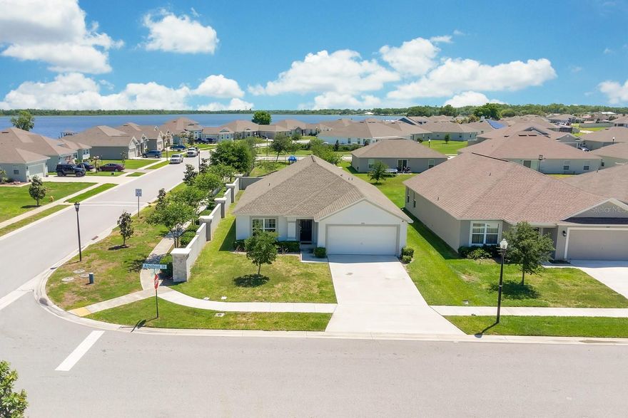 UP TO $5,000 IN BUYER INCENTIVES AVAILABLE! This property may qualify for up to $5,000 in closing cost credit when using the seller's preferred lender. Ask us how to qualify!
Welcome to Sanctuary by the Lake — one of Winter Haven's most sought-after gated lakefront communities, built by Southern Homes along the stunning shores of Lake Rochelle, part of Florida's renowned Chain of Lakes. Whether you're looking for your forever home or a high-demand investment property, this one checks every box.
This move-in ready, beautifully upgraded 3-bedroom, 2-bathroom home seamlessly blends modern design with relaxed lakeside living. Step inside to a spacious foyer that opens into a bright, open-concept living and dining area filled with natural light. Glass sliding doors lead to a generous, fully fenced backyard with room to add a pool — perfect for families and a future value-add for investors.
The show-stopping kitchen is designed to impress, featuring stainless steel appliances, a mosaic tile backsplash, white shaker cabinets, a large center island with sink, and a full pantry. Designer touches throughout — bold accent walls, custom pendant lighting, and wood-look tile flooring — give this home a distinctive, upscale feel that stands out in any market.
The primary suite is a true retreat with a walk-in closet and a spa-inspired en-suite bath complete with a soaking tub, walk-in glass shower, dual-sink vanity, and elegant tile finishes. Two additional bedrooms offer flexibility for family, guests, or a home office. A stylishly updated second bath rounds out the interior.
Outside, enjoy a covered patio and lush backyard — your own private piece of Florida paradise. The 2-car garage adds convenience and storage. Community amenities include exclusive access to Lake Rochelle for kayaking and water sports, scenic walking trails, private docks, and a playground — all with low HOA fees and absolutely NO CDD.
Ideally located near US-27, major shopping, dining, medical centers, and Central Florida's top destinations including LEGOLAND®, Walt Disney World®, and Universal Studios®.
This is a limited opportunity — priced to sell and incentives won't last long. Call today to schedule your private showing!