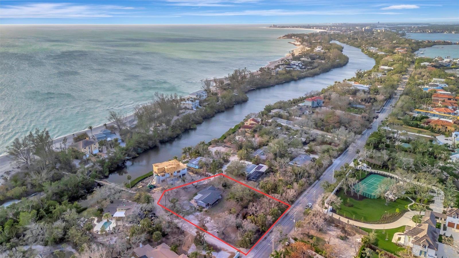 Rare Opportunity on Siesta Key – Expansive Corner Lot with Private Beach Access!
Unlock the potential of this over ¾-acre corner lot with private beach access, nestled on the world-renowned Siesta Key! This is truly a once-in-a-lifetime chance to secure one of the largest privately owned parcels on Siesta Key. While the existing home has sustained storm damage, this property offers an unparalleled opportunity to renovate or build your dream coastal retreat in one of Florida’s most sought-after locations.
Imagine stepping out your front door and strolling mere moments to your private pedestrian bridge, leading directly to your exclusive slice of Siesta Key beach frontage—a luxury that few can claim. With nearly 37,000 square feet of prime land, the possibilities for creating your ultimate island compound are endless. Design a grand estate, complete with a sprawling main residence, guest house, resort-style pool, and even a pickleball court—all just steps from the sand.
Tucked away in a hidden gem of a community, this property is part of an exclusive enclave of only 13 homes along the tranquil Heron Lagoon, offering a rare sense of privacy and serenity. Residents here enjoy private beach access just steps from their front doors, making this one of Siesta Key’s best-kept secrets.
Located on the peaceful south end of the island, this serene enclave offers a tranquil retreat away from the crowds while keeping you just minutes from Siesta Key Village, world-class dining, boutique shopping, and the south bridge to the mainland. Whether you're a visionary builder or a discerning buyer seeking to craft a legacy estate, don’t let this extraordinary opportunity slip away—schedule your private tour today!