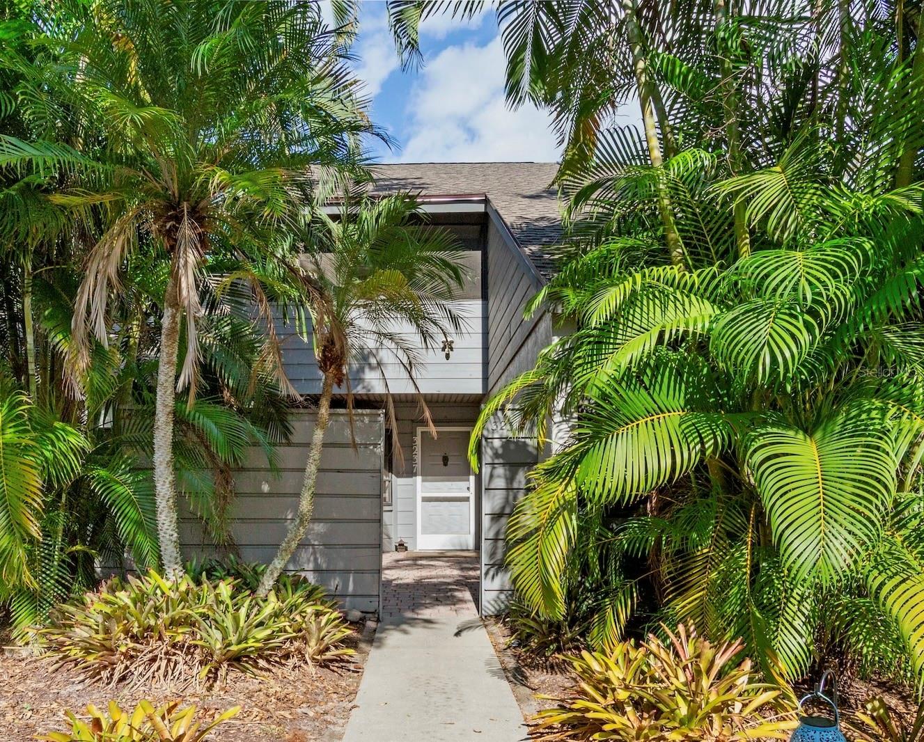 Unique townhome property now available, offering a perfect blend of serene living and central Sarasota convenience. This bright and inviting townhome is nestled among the trees, providing a peaceful retreat in one of the most sought-after locations.
Upon entering, you'll be greeted by vaulted ceilings and an open floor plan that creates an expansive sense of space. The home features beautiful luxury vinyl flooring throughout, updated bathrooms, and a brand-new AC unit installed in 2024 for your comfort. The roof was also recently replaced in 2023, offering peace of mind for years to come.
One of the standout features is the expansive private screened-in back porch, which significantly extends the living area and provides an ideal space for relaxation or entertaining. Upstairs, a versatile loft area offers additional flexible space, perfect for another lounge, a home office, or a creative studio. The upstairs also includes a private bedroom with an en-suite bathroom and French doors leading to its own secluded screened porch, providing a tranquil escape.
This property truly offers a unique opportunity to live in a beautifully updated home within a vibrant and central Sarasota community.