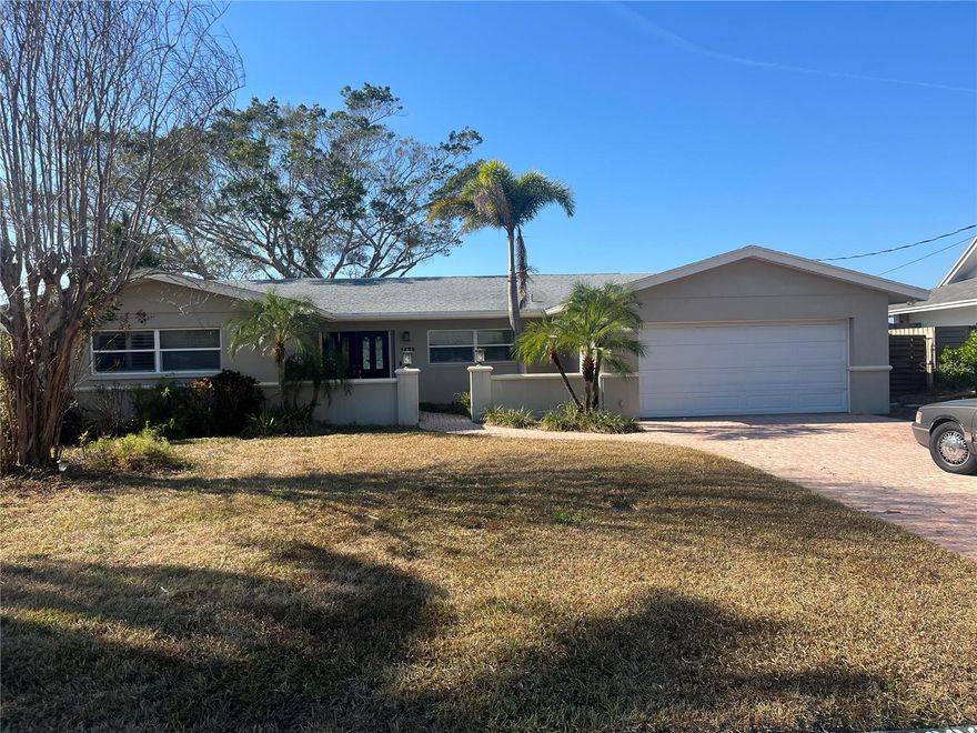 Welcome to your waterfront paradise—a boater’s dream on protected water with a wide-open view! This single-level brick and block home features breathtaking water  views and a raised up seawall. You will enjoy  direct access to the Intracoastal Waterway. 

While the home was impacted by Hurricane Helene, it offers an exceptional opportunity to remodel or build your custom dream home in an unbeatable location. Inside, you’ll find an open floor plan with a spacious great room, exposed beams, and sliding glass doors that open to a sparkling pool and sweeping water views.

Conveniently located close to shopping, malls, and restaurants, and approximately 30 minutes from Tampa International Airport, this home sits in a wonderful, established neighborhood.