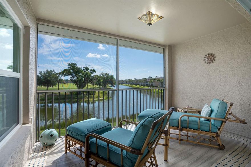 Welcome to Heritage Oaks Golf and Country Club, where vibrant design meet serene Golf and Water views. This beautifully decorated and upgraded FURNISHED home has been thoughtfully redesigned with rich color, personality, and artistic design – creating a truly inviting one of a kind living space. Enjoy peaceful mornings and golden hour sunsets from not just one, but two screened and tiled lanais- offering full water views and picturesque backdrop of the 14th hole and green. The seamless indoor outdoor flow makes this home perfect for both quiet, relaxing, and entertaining. The attention to detail shines throughout with a refreshed aesthetic that brings energy and life into every room, while maintaining an elegant classy feel. The kitchen has been remodeled with luxury lighted cabinets, crown moulding, and quartz countertops. The primary suite was redesigned with a large walk-in shower, and elegant tile finishes. Additional upgrades include: tankless water system (2023) impact/hurricane windows and doors (2023), and HVAC (2018). Additional features include a private one car garage, and additional guest parking as well as a private pool (aside from the clubhouse pool) for owners to enjoy. At Heritage Oaks, residents enjoy bundled, golf, tennis, fitness, dining, and a vibrant, social lifestyle – all surrounded by lush, mature, landscaping, championship, golf, and a variety of wildlife. The private clubhouse was redesigned and completed in 2025. Come live the lifestyle- all within 20 minutes from the famous quartz sandy beaches on Siesta Key, and downtown Sarasota. Sold furnished.