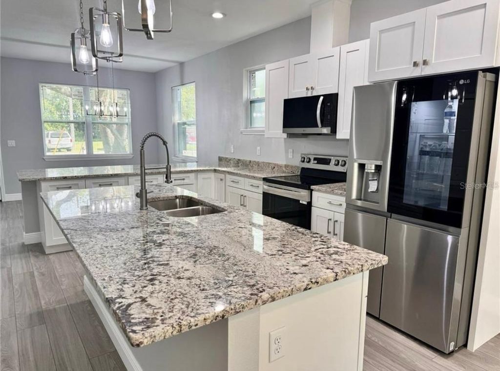 Photo of 4529 W Gore Avenue, Orlando, FL 32811 (MLS # TB8492297)