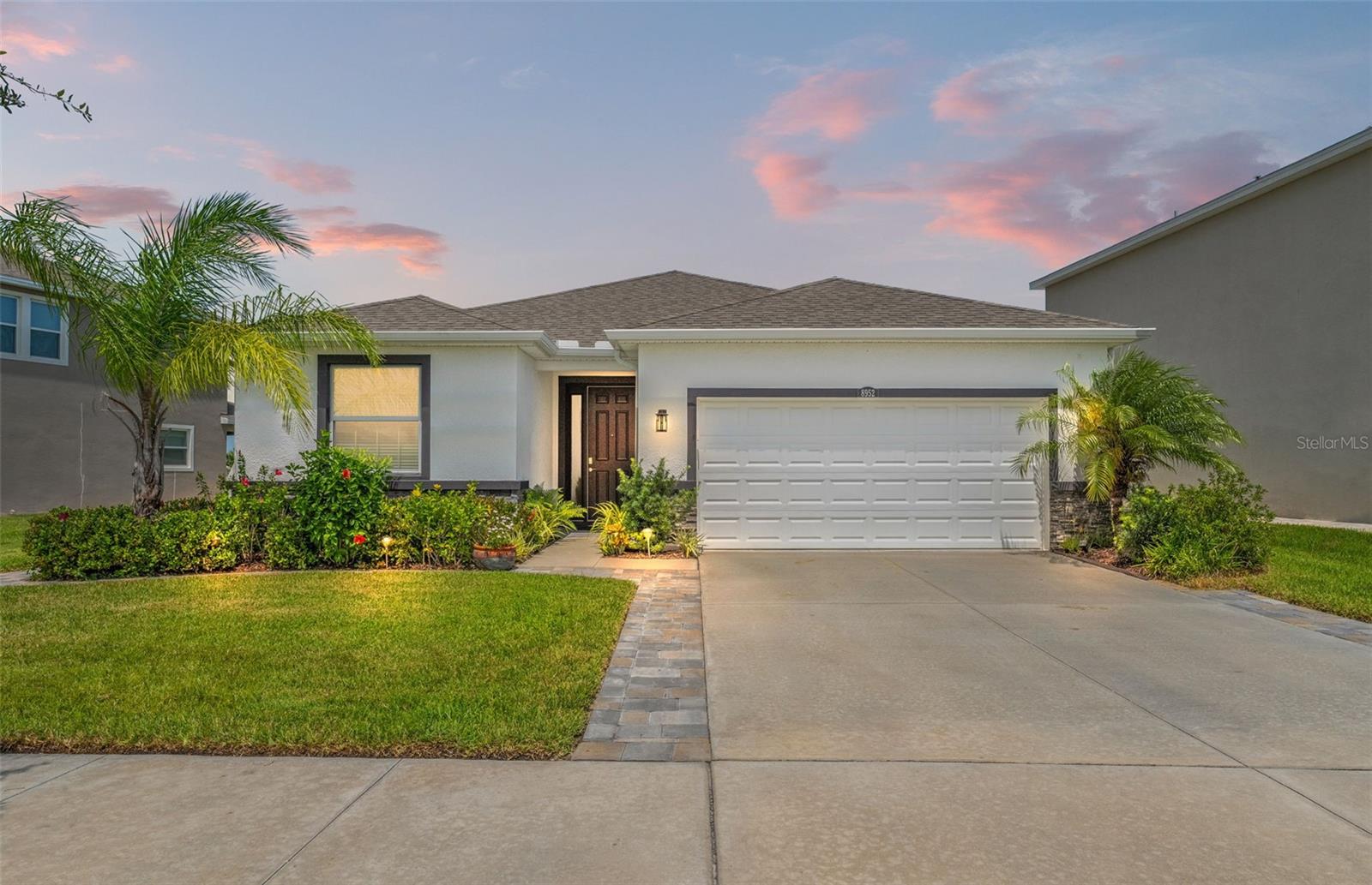 Lagoon Living with Water Views in Epperson! This stunning 4-bedroom, 2.5-bath, single-story home combines modern style with an open-concept design, perfect for both everyday living and entertaining. The kitchen features rich espresso cabinetry, quartz countertops, stainless steel appliances, a walk-in pantry, and a spacious island with breakfast bar seating, flowing seamlessly into the dining and living areas for effortless hosting. Step outside to your screened lanai and extended paver patio overlooking the water, ideal for morning coffee or evening sunsets. The owner’s suite offers serene pond views, a large walk-in closet, and a spa-inspired bath with dual sinks, soaking tub, and separate shower. Located in Wesley Chapel’s award-winning Epperson Lagoon community, you’ll have access to 7.5 acres of crystal-clear water, sandy beaches, water slides, swim-up bars, golf cart-friendly streets, and year-round activities.
Top-rated schools: Wesley Chapel Elementary, Thomas E. Weightman Middle, and Wesley Chapel High. Minutes to The Grove, KRATE dining and entertainment, Wiregrass Mall, Tampa Premium Outlets, and AdventHealth Center Ice.
Live every day like a vacation, schedule your private tour today! Video tour available on YouTube and all social media platforms, just search by address.