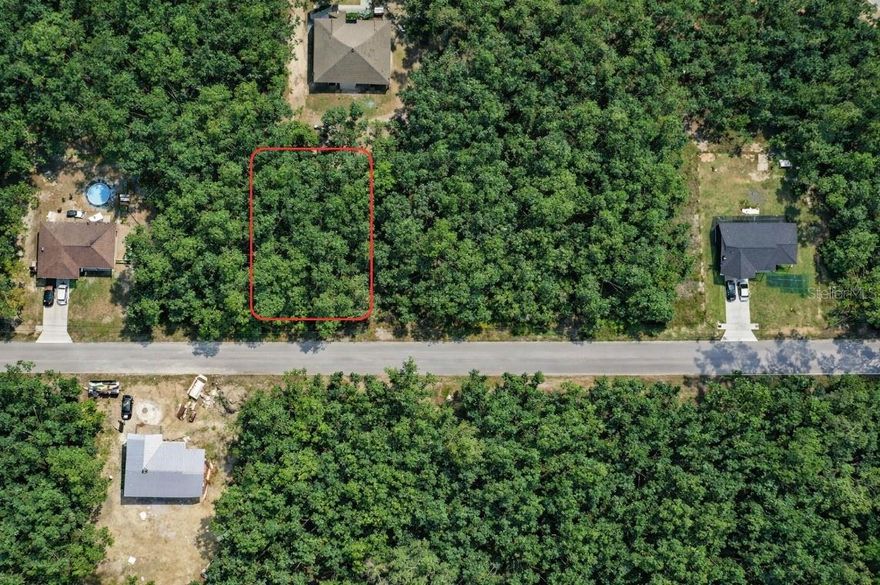Well-located 0.23-acre residential lot on Malauka Pass Circle in Ocklawaha, Florida. Situated on a paved road, this property has electricity available nearby and is positioned in an area experiencing active growth with multiple new constructions and ongoing developments on the same street and surrounding areas.
The lot offers a natural setting with strong potential for future appreciation, making it an excellent opportunity for builders or investors.
Conveniently located with easy access to main roads connecting to Ocala and surrounding regions.
Close to outdoor attractions such as lakes and parks, while still offering a quiet residential environment.
Ideal for building a single-family home in a developing and high-potential area.
Ideal for building a single-family home in a developing and high-potential area.