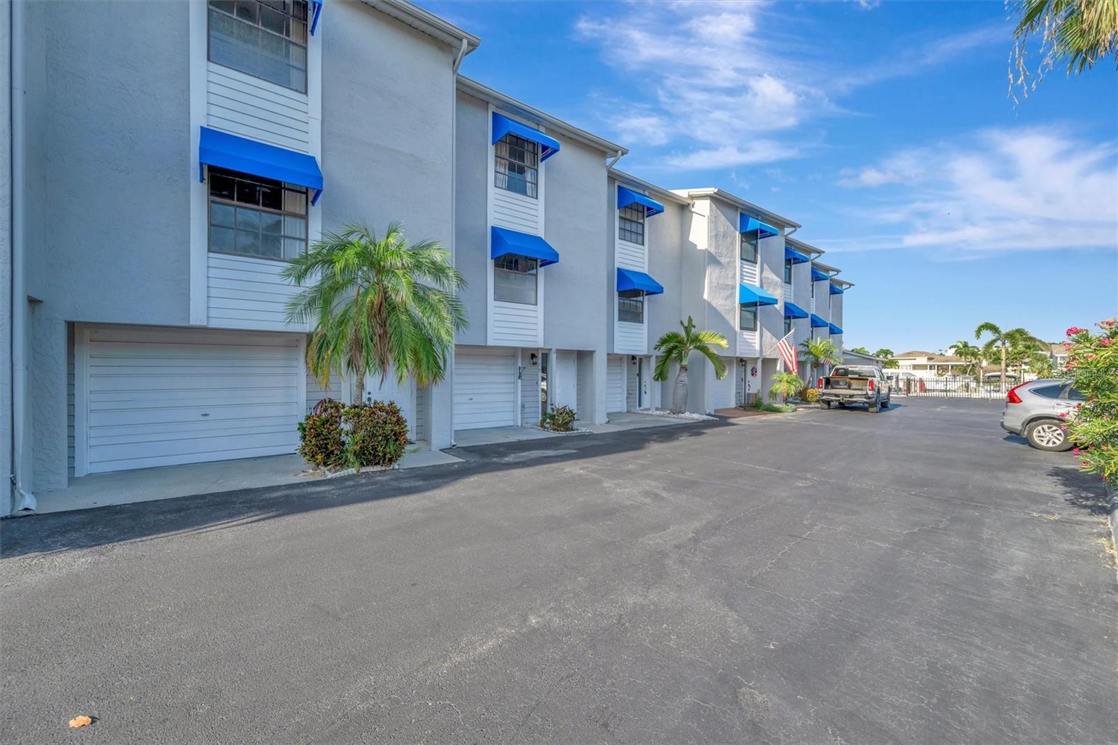 Amazing Location, Move in Ready! Welcome to this wonderful, waterfront complex in Tierra Verde right next to Fort Desoto Park where you can enjoy walking trails, camping, biking, hiking, kayaking, and fishing piers with miles of white sand beaches. It is one of the few communities with direct access to the canal & the heated pool is located directly on the water. Boat slips are available for rent. This spacious 3 bedroom, 2.5 bath townhouse has three levels. The third bedroom is located on the ground level by the garage, has spacious walk in closet and French Doors out to a ground floor patio. The 2nd level is the main open floor plan, with a large kitchen, half bathroom, spacious living/dining room combo with fireplace and sliding doors to the 2nd floor balcony. The 3rd level features two split bedrooms with spacious bathrooms and laundry closet with washer /dryer in the hallway. You can enjoy a Jacuzzi tub in the master bath. The AC unit was replaced a few years ago. The Rent includes water, cable, WiFi, trash; tenants only paying for electricity. Located minutes to world famous beaches, Fort Desoto Park, St Pete Beach. You will have the convenience to I-275, Tampa international airport and much more !