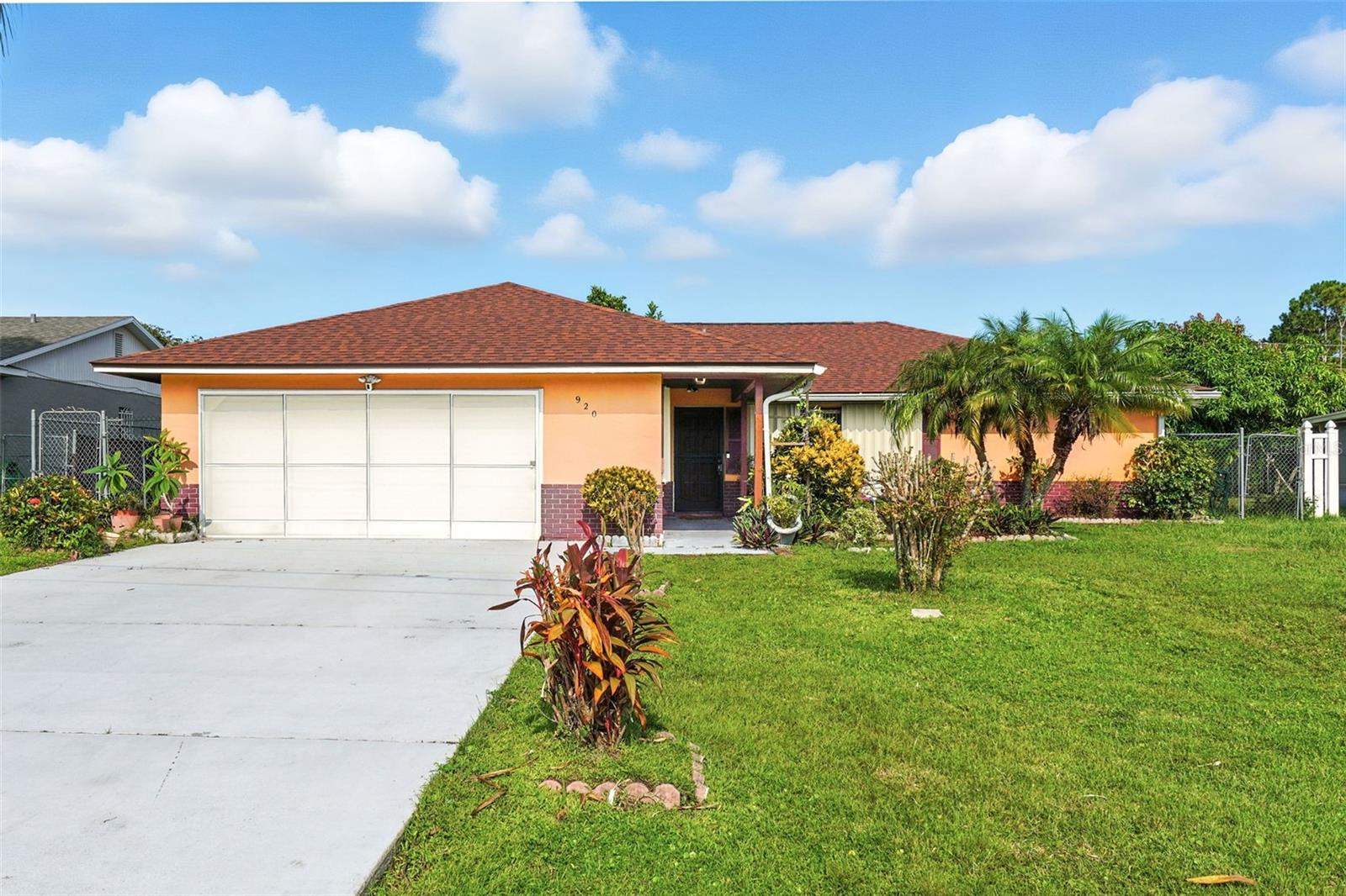 Charming 3-bedroom home in Kissimmee with modern upgrades and community amenities! Welcome home to 920 San Carlos Way, a beautifully maintained single-family home offering 3 bedrooms, 2 bathrooms, and 1,499 sq ft of comfortable living space. Built in 1988, this home has been thoughtfully updated with major improvements, including a new roof, A/C, and water heater—all just 3 years old. The kitchen features newer stainless steel appliances, including a convection oven/range and refrigerator. The master bathroom features a recently updated shower, adding a fresh, modern touch to your private retreat. Step outside to your private backyard oasis with fruit trees, a screened-in patio, and a storage shed for added space and convenience. You'll also enjoy hurricane shutters for extra peace of mind. Located in a desirable community offering a pool, playground, dog park, and fitness center, with the HOA fee covering basic cable, this home has everything you need. Conveniently situated just minutes from grocery stores, shopping centers, and HCA Florida Poinciana Hospital, and less than 30 minutes to Disney World, this home offers the perfect combination of comfort, location, and value. Schedule your private tour today—this one won’t last!