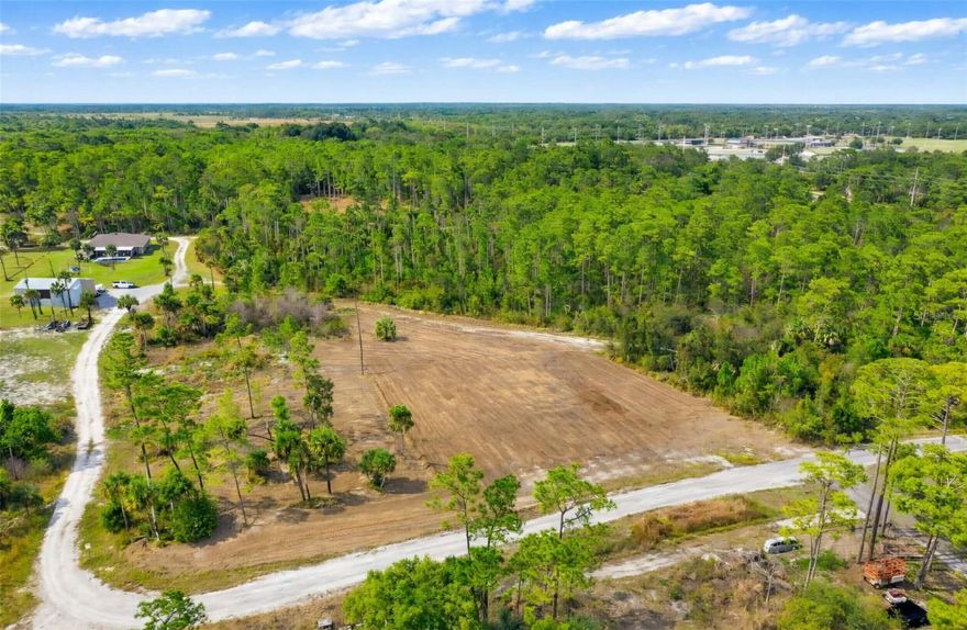 Experience the best of both worlds with these 2 lots that total 2.28 acres of land located in a highly sought area in North St. Lucie County. These lots are located among mainly wooded areas, having only a few neighbors within sight. It features a private paved road entrance, accessible electric through FP&L, and is Ag-1 zoned so that you may bring your boats, toys, livestock, or pets. Additionally, these lots sit at higher elevations than comparable lots, has no recorded wetlands, and no required minimum square footage on your home build. Both properties together are deemed buildable according to St. Lucie County Building Dept.

Within 10 minutes you can be on the beautiful Treasure Coast Beaches, Highway i95, and soon to be able to enjoy the amenities offered at the confirmed building of Bucee's, Publix, and more.

All measurements are approximate.