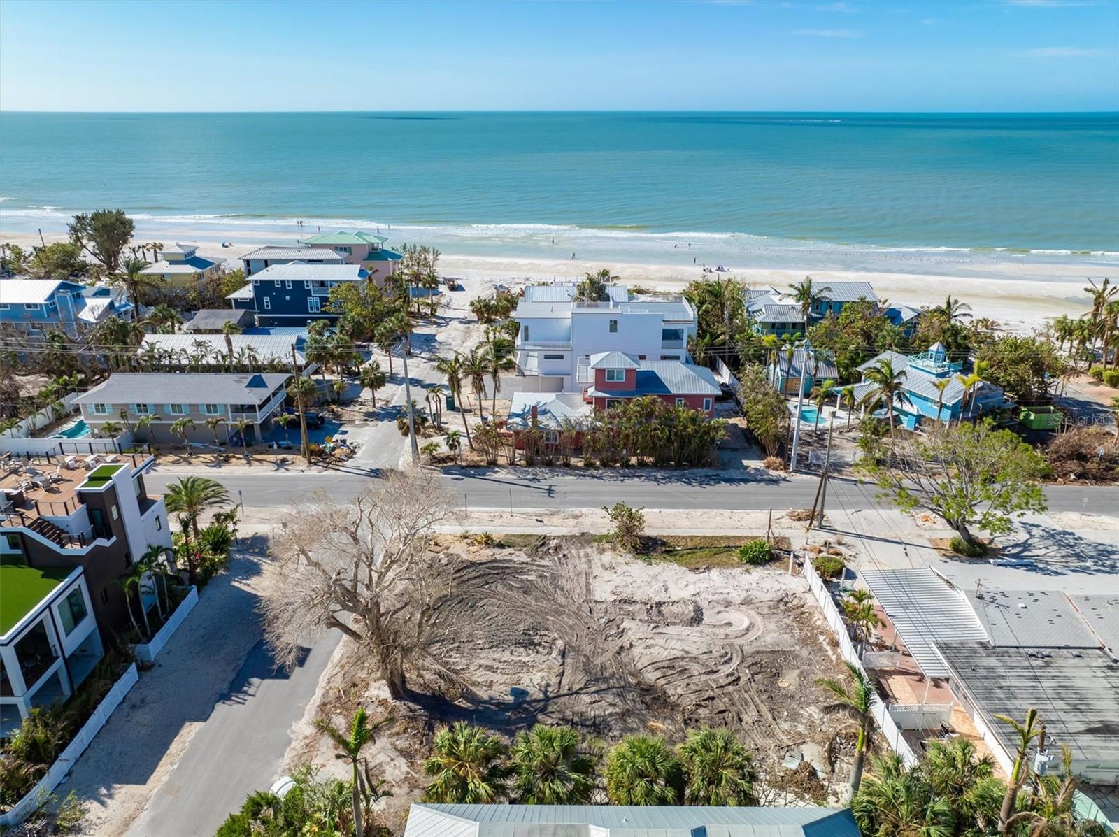 This is a rare and fantastic find on Anna Maria Island. What makes this corner lot so special? First, the location and the size of the lot. Located on the north end and ONE block from the restaurants and shops on Pine Avenue while nestled in a quiet corner away from the hustle and bustle. The lot is nearly beach front with a one minute stroll to the sand and is oversized boasting nearly 11,000 square feet in privacy. Secondly, because of its Bert Harris designation (see attached), it is approved to welcome a family or group of 16 guests which is very rare on Anna Maria. Don't miss out on this rare opportunity to own a slice of island heaven. Plans for a brand new 6 bedroom single family home, available upon request. Vacation rentals 1-7 days are permitted.
