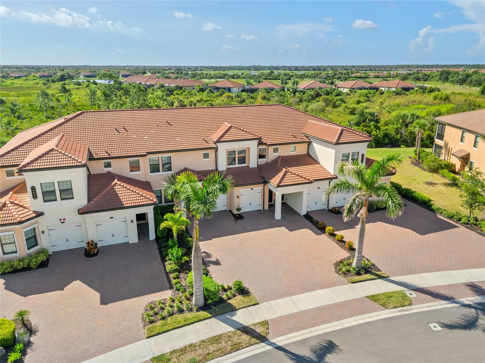 Welcome to Sarasota National, a resort-style amenity-rich master planned community of 1584 total homes on 2400 acres, designated as an Audubon International Certified Signature Sanctuary. This vibrant community is 20 miles South of downtown Sarasota, 7 miles from charming downtown Venice and only 6 miles from the warm sugar sand Gulf beaches. Located on Rte 41 (Tamiami Trail) conveniently down the street from Wellen Park, CoolToday Park, Spring Training home of the Atlanta Braves, and a wealth of shopping and dining options.
This warm, inviting, beautifully decorated Tuscan inspired 3 yr young 3 bed/2 full bath condo at Crooked Creek is surrounded by native wetlands, preserves, open space and lakes, providing a rich panorama right outside your balcony– perfect for any nature lover. No expense has been spared in upgrades – from $20,000 in California Closets, a Maytag whole house water softener/purifier, retractable front door screen and polyaspartic garage floor -there's luxury in the details.
Community amenities include a 32,000 square foot clubhouse campus with formal and casual dining and gathering spaces such as the coffee room and card room. The fitness center, spa treatment rooms, resort inspired pool w/ lap lanes and beach entry, pickleball, tennis and bocce ball will satisfy any exercise junkie while the convenient playground will answer all the grandchildrens needs. A separate dog park is sure to please Fido and Fifi.
Sarasota National Golf Club's 18-hole championship course was
designed by Gordon Lewis and provides an exhilarating test for
golfers of any skill level and is available to book from May 1to October 31st for homeowners in the Lake Community. Live the life you’ve worked hard to achieve and don't miss this opportunity to own in one of Venice's most well thought of communities.