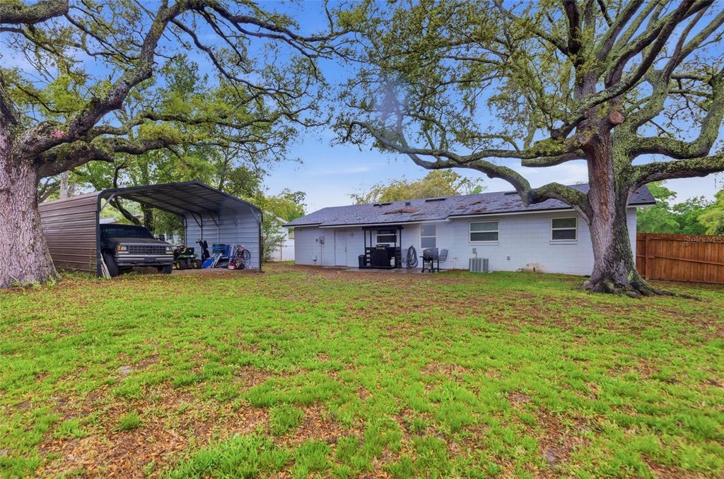 Photo of 3715 Trianon Drive, Orlando, FL 32818 (MLS # O6397704)