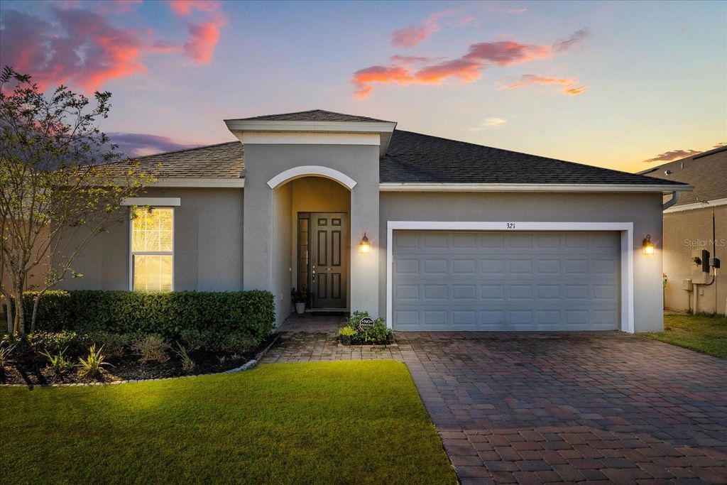 Photo of 321 Meadow Pointe Drive, Haines City, FL 33844 (MLS # O6361843)
