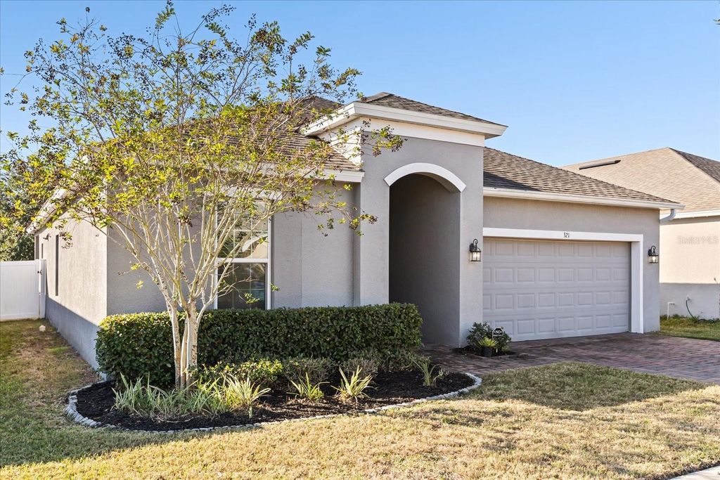Photo of 321 Meadow Pointe Drive, Haines City, FL 33844 (MLS # O6361843)