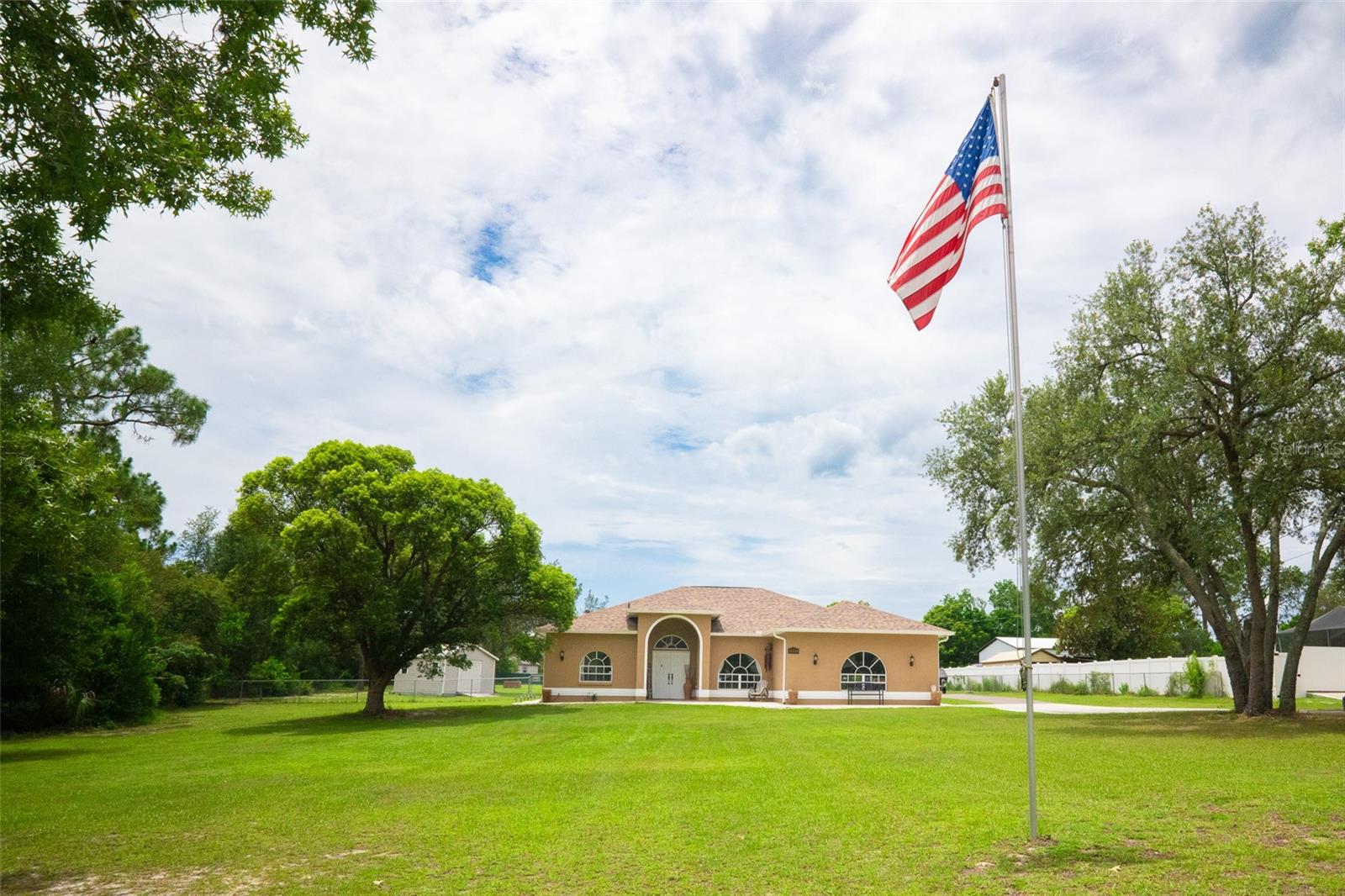 Welcome to 16248 Verndale Lane, Spring Hill, FL! This well-maintained 3-bedroom, 2-bathroom home sits on a fully fenced 1-acre lot and features an attached garage and a spacious open floorplan, ideal for comfortable living and entertaining.
Inside, you'll find clean, modern tile flooring throughout, creating a sleek and low-maintenance interior. The attached 1-bedroom, 1-bathroom mother-in-law suite includes its own private entrance, full kitchen, and washer/dryer hookups, offering excellent flexibility for multi-generational living, guests, or rental income. It also provides direct access to the backyard, enhancing its privacy and convenience.
The outdoor space is move-in ready, featuring a new above-ground pool and a charming gazebo, perfect for relaxing or hosting gatherings. A newly installed drain field adds even more value and peace of mind.
With thoughtful upgrades, versatile living space, and a private outdoor oasis, this property is ready to welcome you home!