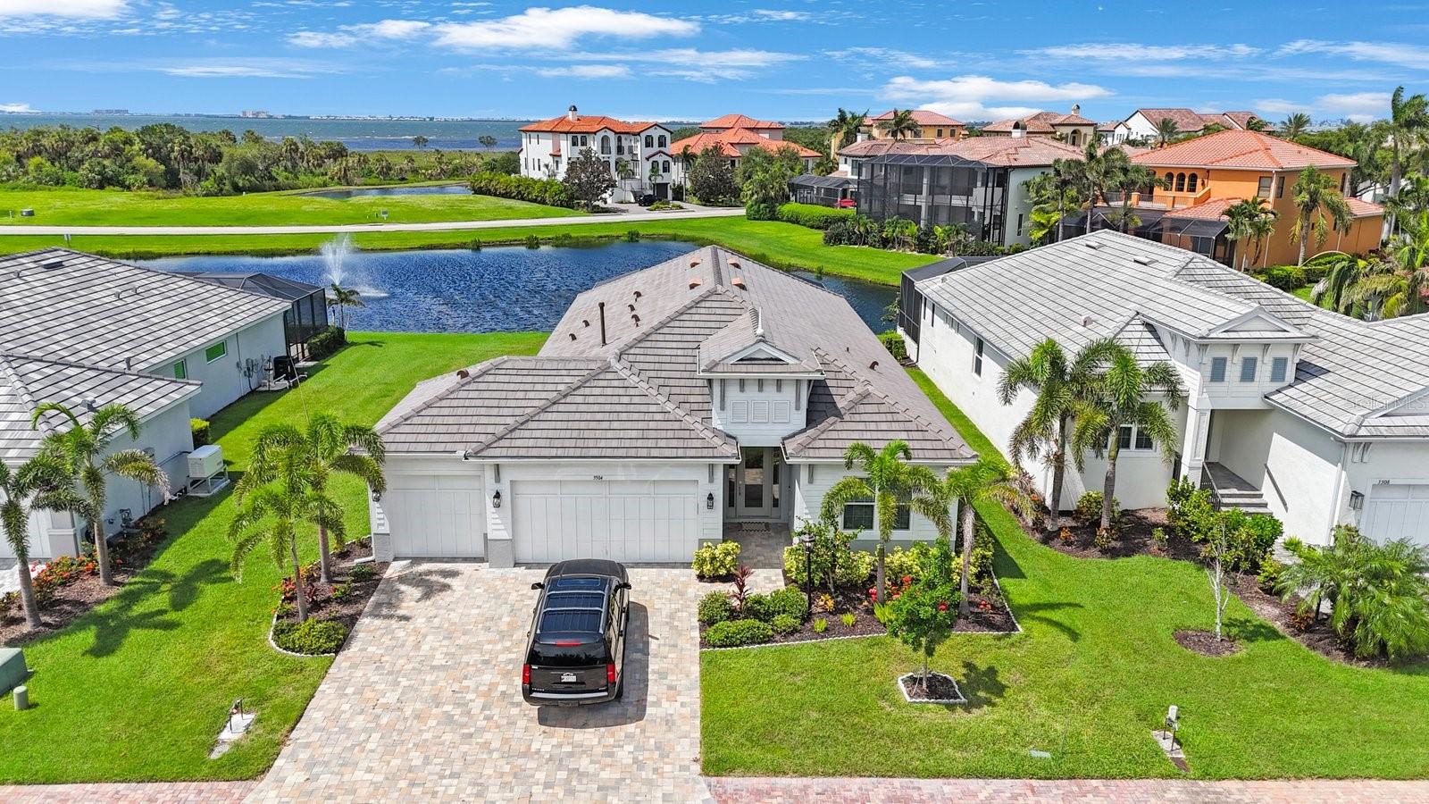 FOR RENT NEAR IMG ACADEMY! Welcome to this immaculate 4-bedroom, 3-bath home nestled within the highly desirable gated community of Legends Bay, just moments from the shores of Sarasota Bay. Built in 2022, this elegantly designed residence offers a seamless blend of modern luxury and coastal charm, highlighted by serene water views and a private screened-in saltwater pool with a spacious, covered lanai—perfect for al fresco dining and relaxing in style.
The primary suite serves as a luxurious retreat, featuring two walk-in closets, a dual-sink vanity, and an oversized double shower. Designed with peace of mind and quality in mind, the home includes hurricane impact windows and has never experienced flooding or storm damage.
Legends Bay offers residents 24/7 gated security, a scenic lakeside clubhouse and pool with sunset views, and a picturesque boardwalk pier that winds through protected mangroves to stunning vistas of Sarasota Bay.
Ideally located near IMG Academy, Sarasota-Bradenton International Airport, world-class golf and tennis, Gulf Coast beaches, downtown Sarasota, and premier shopping and dining.