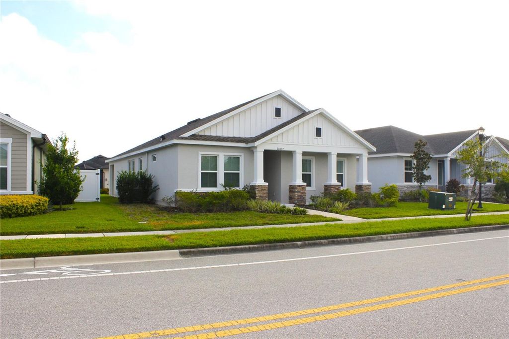 Photo of 28547 Hillcrest Valley Boulevard, Wesley Chapel, FL 33543 (MLS # TB8388801)