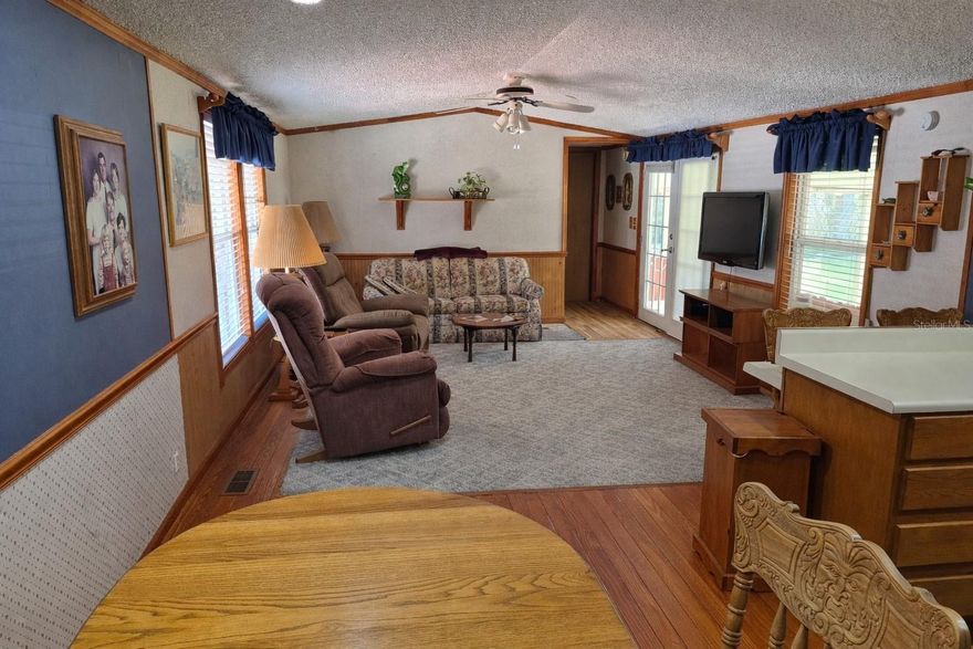 If you are a handyman that loves fishing, This is for you. No HOA waterfront single wide. The large waterfront deck needs replaced but the home is well cared for. Move in ready and furnished.