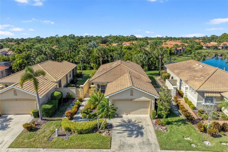 Nestled within one of Sarasota’s most prestigious gated communities, this home offers the perfect blend of natural beauty, resort-style living, and everyday convenience. The Venetian Golf and River Club welcomes you with lush landscaping, 24-hour security, and an impressive array of amenities designed for an active yet relaxed Florida lifestyle.

Just beyond the main boulevard, this gorgeous residence sits on a serene homesite with tranquil views of a pond and wooded preserve. Entering from the side of the home, you’re welcomed by high tray ceilings, an open floor plan, and custom granite counters. The kitchen features abundant natural light through one of three sliding glass doors, a charming breakfast nook, two pantries, and storm shutters, along with double-pane windows throughout and an alarm system for added peace of mind. The separate laundry room includes a sleek black-and-chrome washer and dryer, and ceiling fans in every room enhance comfort year-round. This functional split floor plan offers both space and privacy.

Unwind in the back lanai with a book while enjoying tranquil water views and the sounds of nature. The two-car garage includes a utility sink and ample storage, and exterior maintenance is made easy with lawn and shrub care included.

Residents enjoy a wealth of resort-style amenities, including an 18-hole championship golf course, tennis center with six Har-Tru courts, pickleball, a resort-style pool and hot tub, a newly remodeled tiki bar, lap pool, state-of-the-art fitness center, aerobics and yoga studio, bocce courts, and a 70-acre natural park along the Myakka River with an elevated walking trail, picnic cabana, and observation area. After Sunday’s made-to-order omelet at the clubhouse, enjoy a game of bocce or relax with neighbors at the inviting indoor-outdoor dining areas and bar. The clubhouse also features an active social calendar and a tennis shop.

Beautifully lit sidewalks encourage evening strolls, and a roaming security vehicle provides added comfort. Fees include lawn maintenance, irrigation, basic cable, and access to all resort amenities, allowing you to fully embrace the Florida lifestyle in this exceptional gated community.