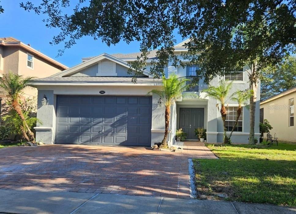 This stunning home is situated in a gated community and features 5 bedrooms. The master bedroom is located on the first floor and boasts his and her walk-in closets, an oversized shower, a garden tub, and double vanities. As you enter the home, you will find the formal dining and living room area with carpet flooring. The sliding glass door leads to the 8x8 patio. The kitchen offers plenty of cabinet space and is connected to the family room. Additionally, there is a half bathroom and a laundry room with a closet on the first floor. The second floor houses 4 more bedrooms, a Jack and Jill bathroom, a loft, and an additional guest bathroom.
