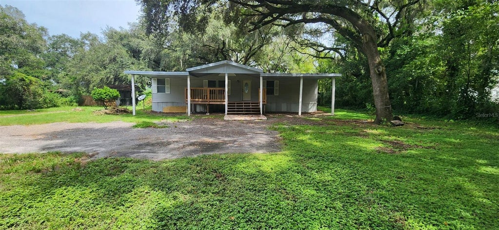 Photo of 34949 Appaloosa Trail, Zephyrhills, FL 33541 (MLS # TB8561253)