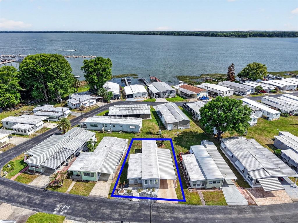 Photo of 465 Marina Lane, Tavares, FL 32778 (MLS # O6399073)