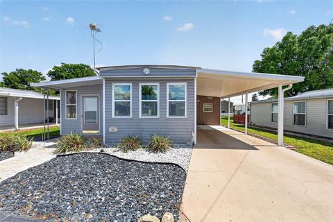 Photo of 465 Marina Lane, Tavares, FL 32778 (MLS # O6399073)