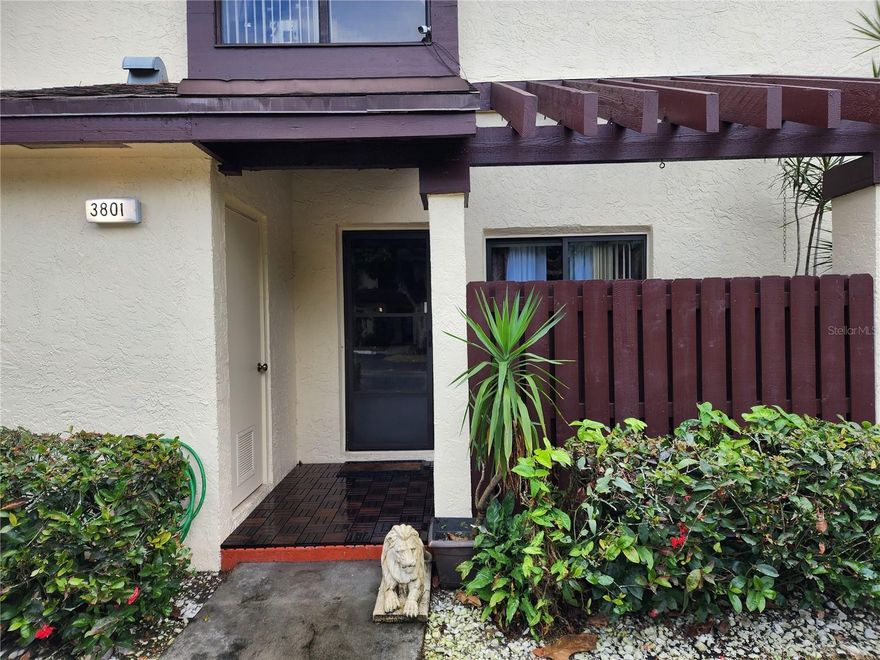 Well-maintained 2BR/2.5BA townhome with peaceful lake views from a screened, enclosed patio. Kitchen features granite countertops, wood cabinetry, and stainless steel appliances. Vaulted ceilings in both bedrooms, wood flooring in the primary bedroom, and tile throughout the main living areas. Washer and dryer in unit, plus attic storage with shelving. Located in The Township community with clubhouse, pool, fitness center, theater, tennis, racquetball, playground, and more. Convenient Coconut Creek location near shopping, dining, and major roads.