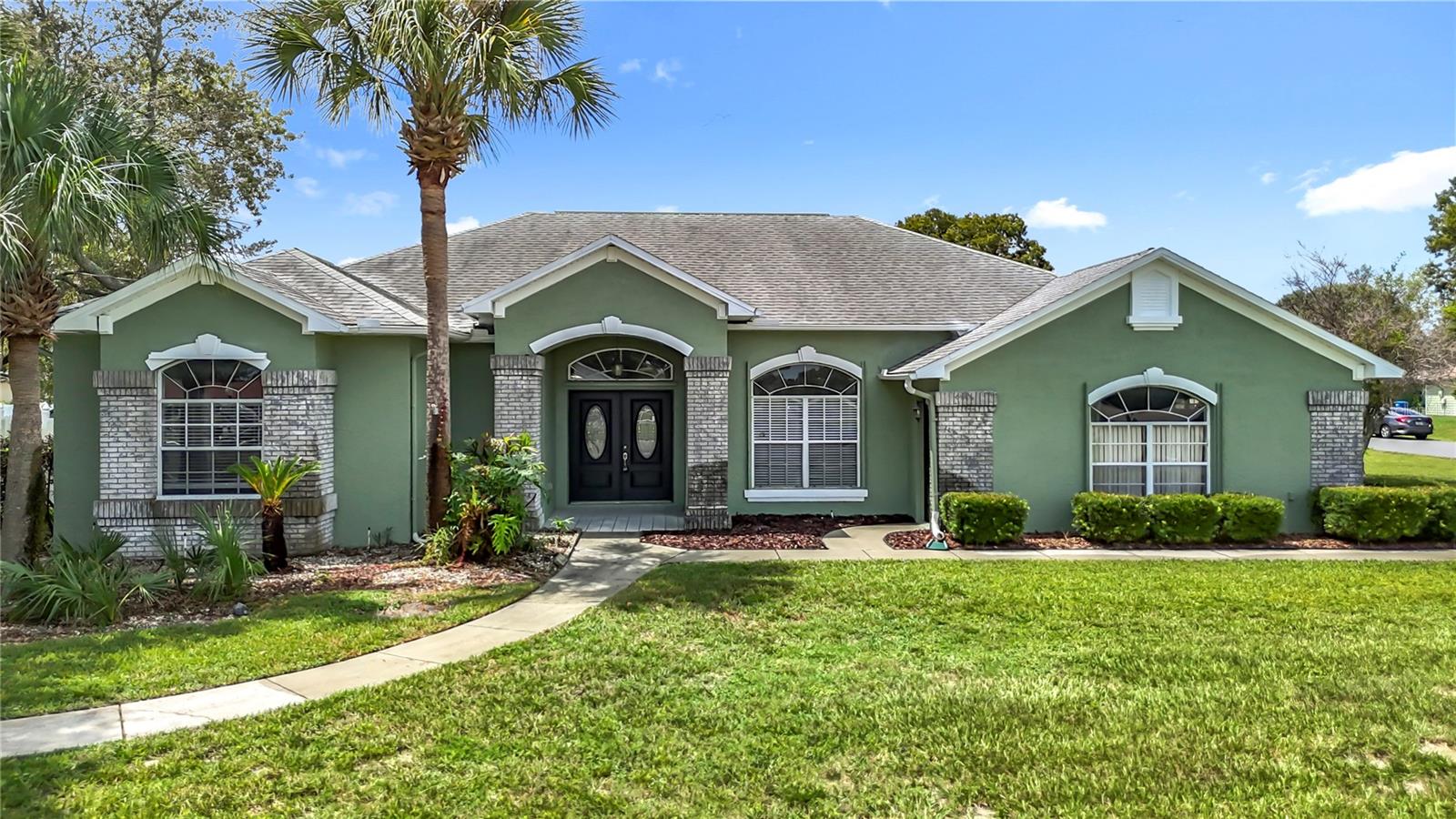 Discover your dream home at 11014 Monarch St, Spring Hill, FL 34608—a stunning one-story, 3-bedroom, 2-bathroom pool home boasting 2,328 square feet of beautifully updated living space. This move-in-ready gem features a recently installed HVAC (2025), water heater (2025), and a roof from 2018, ensuring years of worry-free living. The modern kitchen dazzles with stainless steel appliances, sleek granite countertops, and elegant wood cabinetry, perfect for culinary enthusiasts. Unwind in the spacious, open family room, complete with a cozy fireplace, or step outside to your private oasis—a screen-enclosed in-ground pool and spa, ideal for relaxation or entertaining. Fresh interior and exterior paint, along with a new garage door, enhance the home’s curb appeal and functionality, complemented by an attached 2-car garage. Nestled in the heart of Spring Hill, this home is just minutes from vibrant local attractions. Enjoy outdoor adventures at Weeki Wachee Springs State Park (6 miles), famous for its mermaid shows and kayaking along crystal-clear waters. Explore the serene trails and wildlife at the Chassahowitzka National Wildlife Refuge (12 miles) or spend a day fishing and boating at Hernando Beach (10 miles). For family fun, head to the nearby Fun Station USA (8 miles) or catch a movie at Beacon Theatres in Brooksville (15 miles). With easy access to shopping, dining, and top-rated schools, plus the Suncoast Parkway for quick trips to Tampa (40 miles), this home offers the perfect blend of tranquility and convenience. Don’t miss your chance to own this meticulously updated Spring Hill retreat!