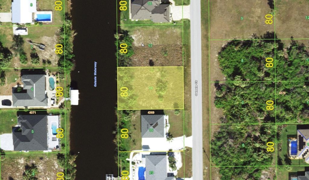 Photo of 9316 Galaxie Circle, Port Charlotte, FL 33981 (MLS # D6137860)