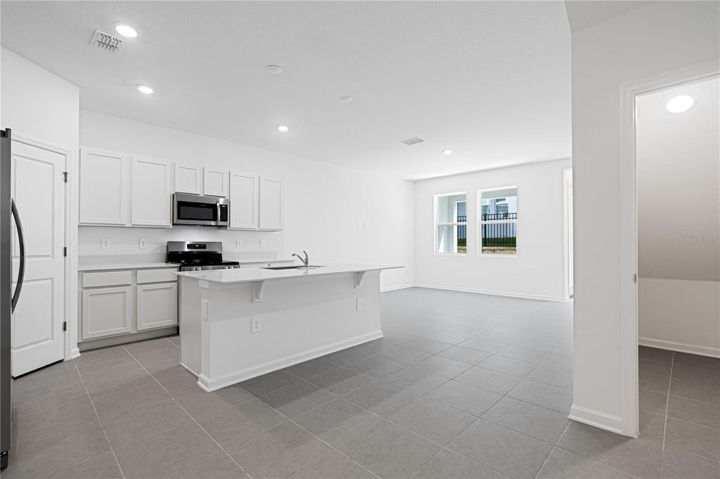 Photo of 3119 Kurtz Terrace, Davenport, FL 33837 (MLS # O6401534)