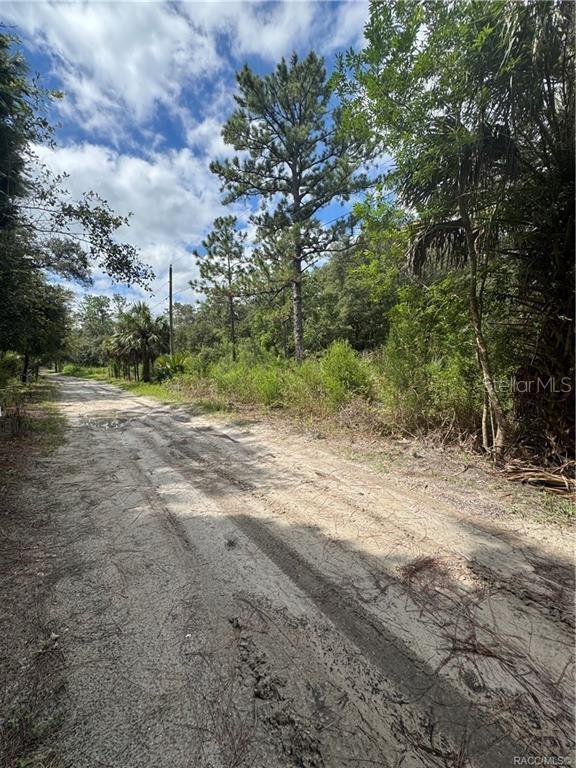 AMERICAN DATA & COMPUTER CREDIT CORP UNREC - Land