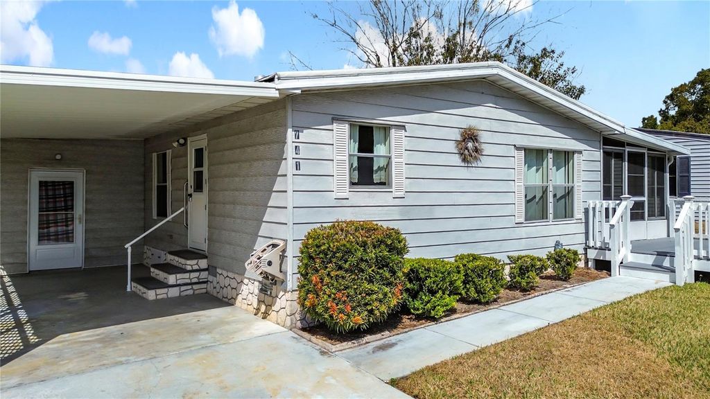 Photo of 741 Royal Palm Avenue, Lady Lake, FL 32159 (MLS # G5108487)