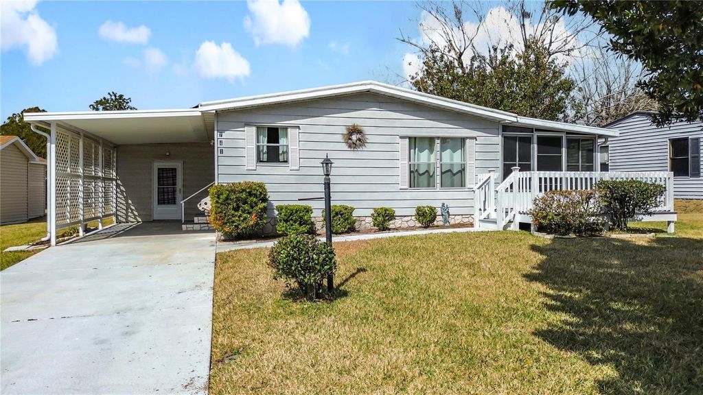 Photo of 741 Royal Palm Avenue, Lady Lake, FL 32159 (MLS # G5108487)