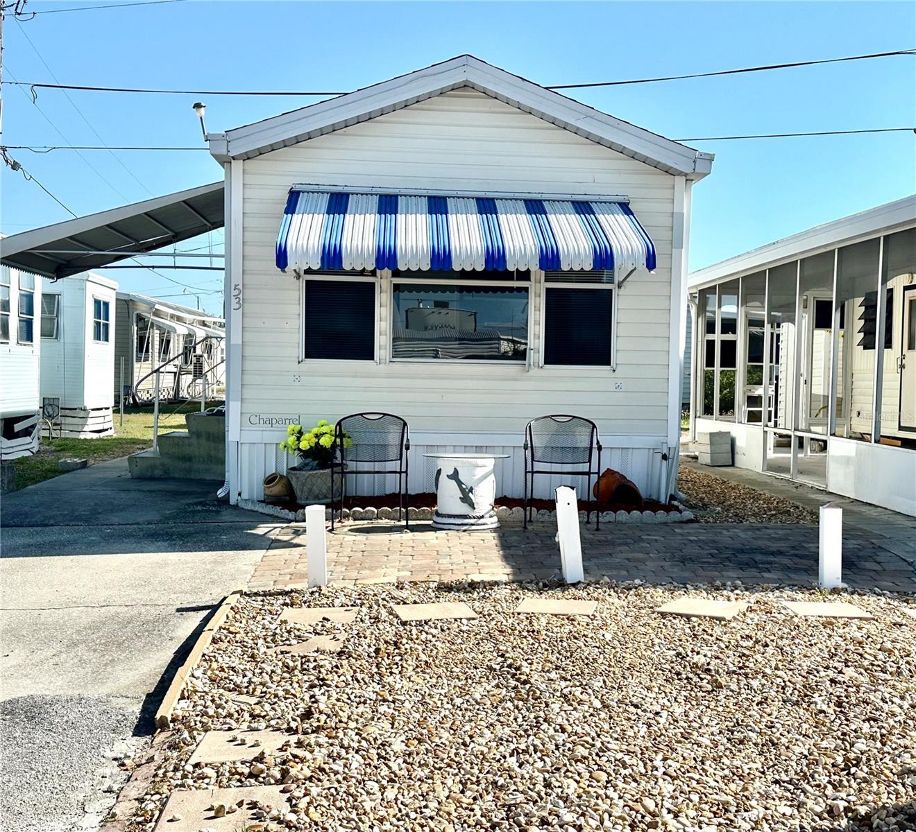 UNIQUE opportunity to grab this IMPECCABLE TURNED KEY - MOVE IN READY PARK MODEL IN TROPIC ISLES! A 55+ Resident Owned Waterfront community. This unit offers 1 bed, 1 bath and an spacious living room. A nice back patio along with a large shed. This home features a spacious paved front sitting area—perfect for enjoying your favorite afternoon drink while soaking in the warm community vibes. Whether you're greeting neighbors, lounging in the sun, or parking your golf cart, this thoughtfully designed space offers both charm and functionality. Tropic Isles offers an array of amenities and endless activities for your enjoyment. Recreational facilities include a full service MARINA and BAIT SHOP, social rooms, shuffleboards and so much more!