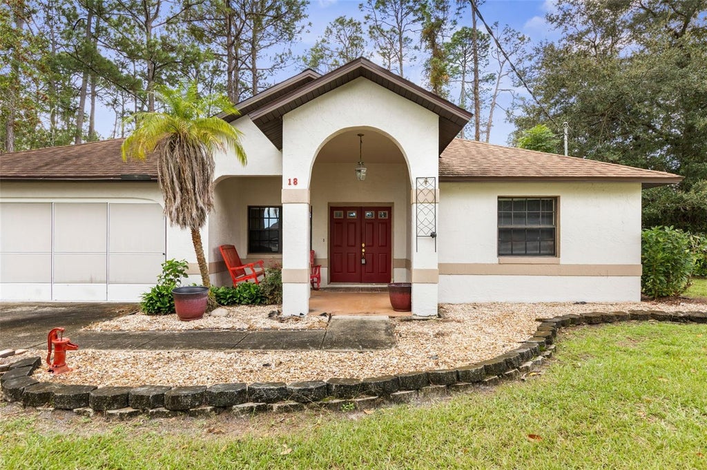 Photo of 18 Windermere Place, Palm Coast, FL 32164 (MLS # FC322431)