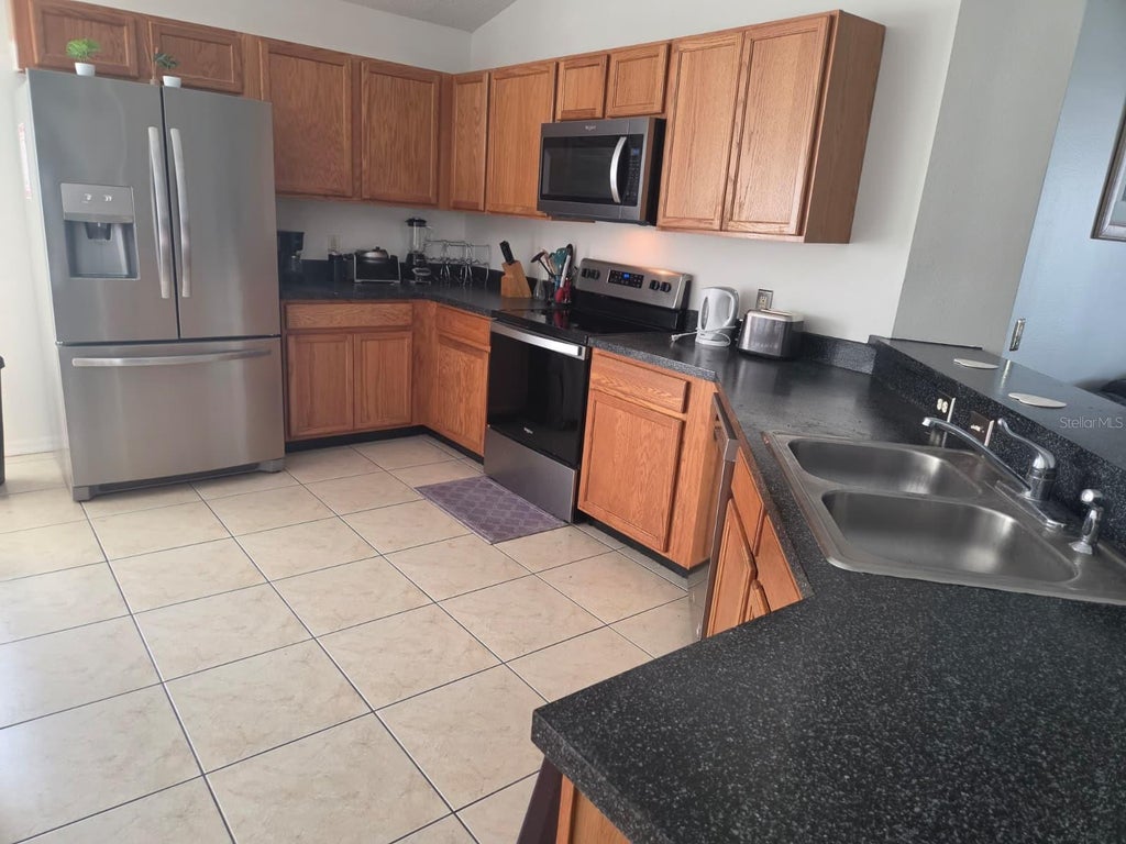 Photo of 142 Pine Cone Drive, Davenport, FL 33897 (MLS # O6435962)