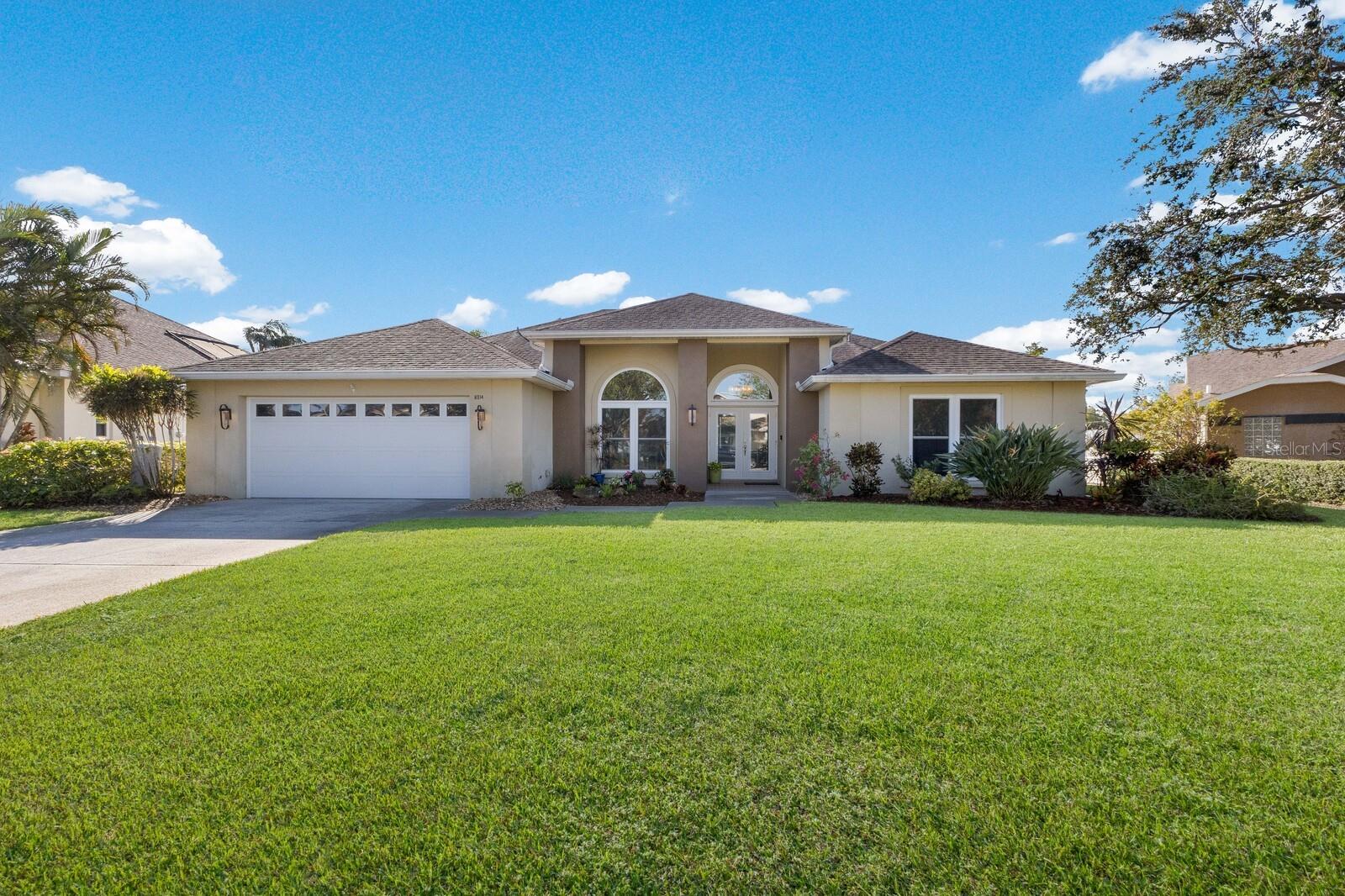 ABSOLUTELY STUNNING MODEL PERFECT POOL HOME IN PINE MEADOW!!! This exquisite property is the epitome of Florida living, meticulously upgraded and remodeled to perfection. Simply unpack and settle into this 4 bedroom, 3 bathroom pool home, boasting over 2,700 sqft of luxurious living space. The list of features is endless: new HURRICANE IMPACT WINDOWS AND SLIDERS, dual A/C systems, a newer pool heater, solar power for unbeatable efficiency, newer appliances, an irrigation well, and so much more! The open floor plan is bathed in natural light, creating an inviting and airy ambiance, while high ceilings, crown molding, and tropical landscaping elevate the charm. From the moment you step inside, you’ll be captivated by the attention to detail. The warm wood-plank tile flooring runs throughout, complementing the seamless flow of the home. The layout includes a formal dining room, a formal living room, and a spacious kitchen-family room combo—ideal for both entertaining and everyday living. The chef’s kitchen is a showstopper, featuring stunning quartz countertops, premium Jenn-Air stainless steel appliances, and a large island with a breakfast bar. Enjoy casual meals in the breakfast nook or host gatherings in the elegant formal dining room. The master suite is a private retreat, offering a spacious bedroom with pool views and room for a cozy sitting area. The spa-like master bathroom is pure luxury, complete with designer tile, a water closet, a seamless glass shower with multiple showerheads, and a dual vanity that exudes sophistication. Step outside through the rear sliders and into your own slice of paradise. The low-maintenance backyard is a dream, with a screened-in lanai, multiple seating areas, and a solar heated pool surrounded by lush landscaping—perfect for soaking up the Florida sun or entertaining guests! Additional highlights include a generously sized laundry room with a sink, an extended 2-car garage, and a PRIME location! NOT IN A FLOOD ZONE! You’re within walking or biking distance to Robinson Preserve, a 682-acre natural haven featuring trails, lookout towers, kayak launches, and more. Plus, you’re just minutes from the pristine white sands of Anna Maria Island.This home truly has it all. Don’t let this incredible opportunity pass you by—schedule your showing today!
