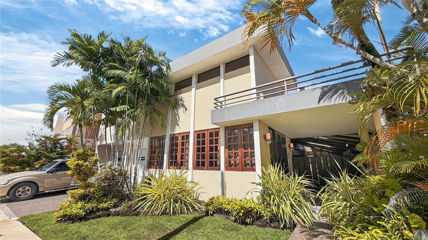 Spacious two-story home in Estancias de San Fernando, Carolina—ideal for those seeking comfort and privacy. It features 4 bedrooms, a pool, a terrace perfect for gathering with family or friends, and a solar system. Gated community with access control and 24/7 security guard. Easy access to Baldorioty de Castro Expressway, making it very convenient for getting to San Juan, the airport, and the main areas of Carolina.