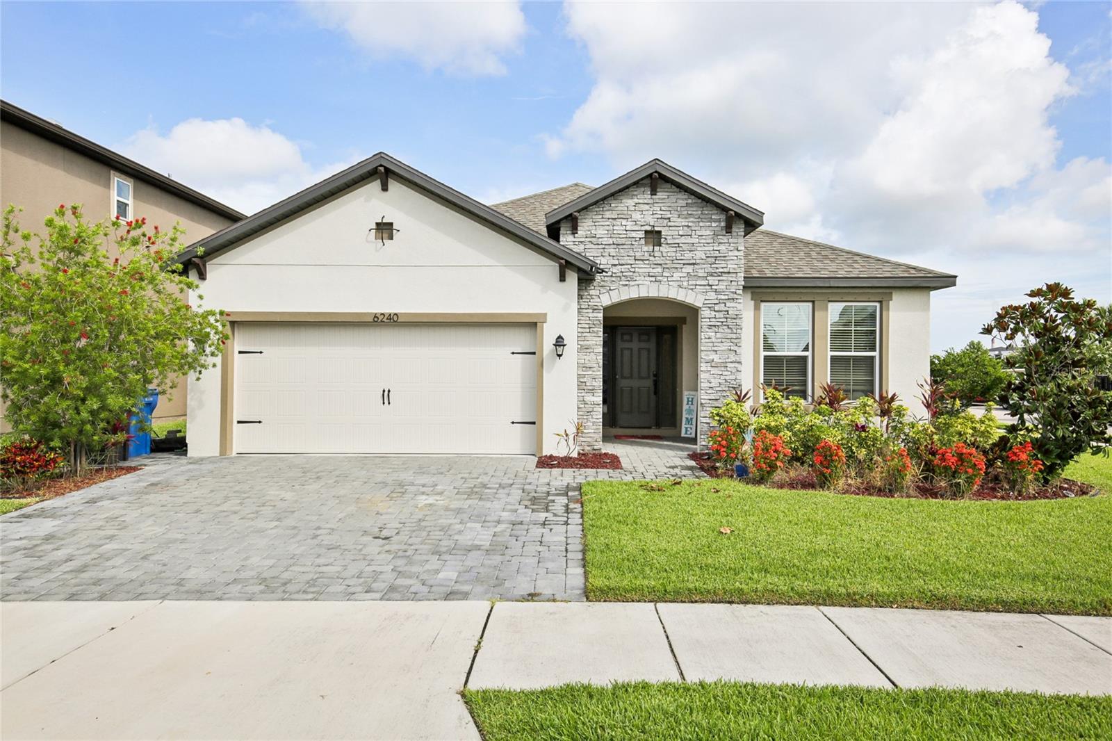 Paradise Found in this Stunning Waterset Home!** Welcome to this breathtaking 4 bedroom, 3 full bath home
built by Beazer Homes. Situated on a corner lot in the highly sought-after Waterset community. The Sea Breeze
floor plan boasts an open concept design with a split bedroom layout, and a spacious entryway and hallway.
The home features ceramic tiles throughout the common areas, quartz counter tops in the kitchen and
bathrooms, and 42" kitchen cabinets. The Owners Suite is a true retreat, complete with dual sinks, a spacious
walk-in shower and tub combo, and an enormous walk-in closet. With its convenient location and array of
amenities, Waterset is the perfect place to call home. Residents of Waterset can enjoy resort-style living with:
Pools, Trails, Basketball, Tennis, and Pickle-ball courts, State-of-the-art gyms, Childcare options.
