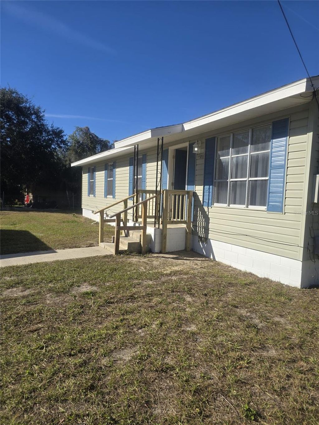 Photo of 701 W Beresford Road, Deland, FL 32720 (MLS # V4946355)