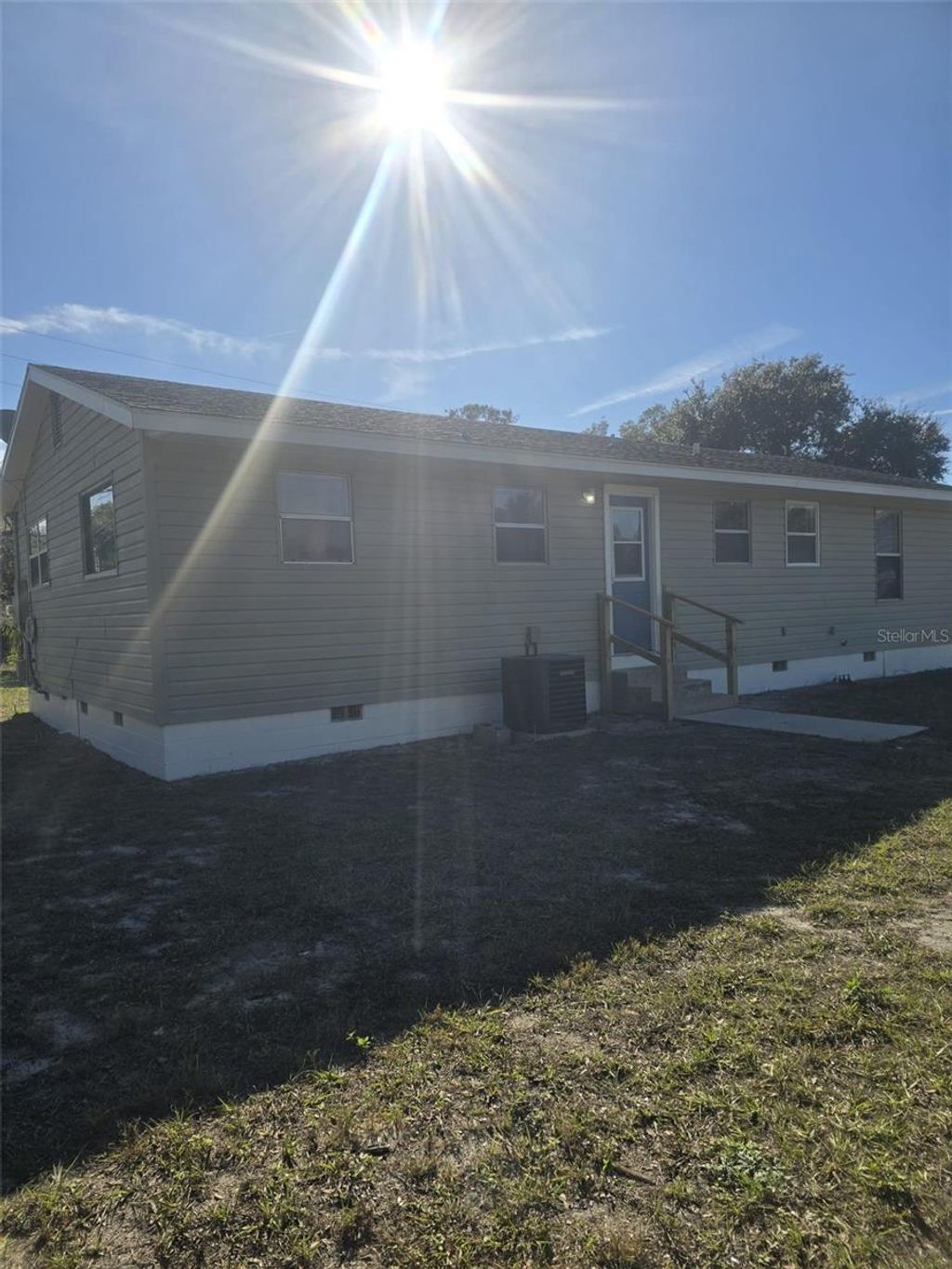 Photo of 701 W Beresford Road, Deland, FL 32720 (MLS # V4946355)