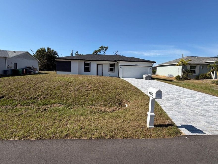 This immaculate, newly built 4-bed, 2-bath home is move-in ready or perfect for renting out! With no HOA restrictions, enjoy ultimate freedom. The open floor plan offers spacious, inviting rooms designed for comfort, while the large patio creates the ideal spot for Florida’s year-round sunshine. Located in a sought-after neighborhood, you’re close to Port Charlotte’s community and amenities. Additional features include a double garage and elegant laminate flooring. Don’t miss this exceptional opportunity to make this beautiful home in a prime location!