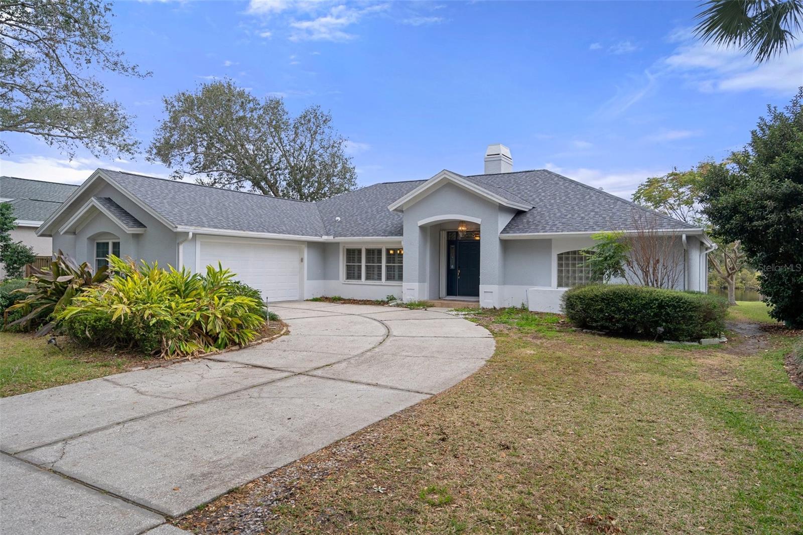 One or more photo(s) has been virtually staged. Welcome to this spacious 4-bedroom, 3-bathroom home in Windsor Park. Just 20 minutes from Tampa International Airport and downtown Tampa, with its exclusive restaurants and entertainment, this home offers the perfect balance of convenience and tranquility. Built in 1991, this 2,340 sq. ft. home provides a peaceful retreat with stunning lake views and no direct backyard neighbors.
The expansive backyard not only offers beautiful views but also has plenty of space to add a pool, making it perfect for outdoor gatherings, barbecues, or simply enjoying the serenity of the lake. Inside, the kitchen features granite countertops and modern cabinetry, while the open-concept layout flows seamlessly into the family room with a cozy stone fireplace. The home also offers a formal living room and dining room, perfect for hosting special events.
Hurricane-impact windows add peace of mind, and the front door is equipped with a protective shutter to guard against wind and debris.
Windsor Park is a gated, man-guarded community with 24/7 security at the main entrance and an additional guard for the private boat and RV storage area, exclusively for residents. The neighborhood also features a clubhouse, a park with a playground, tennis and basketball courts, a dog park, charcoal grills, picnic tables, and scenic hiking trails—all with no CDD.
?? This home also offers flexible options to fit your needs. Please contact the listing agent for details.
